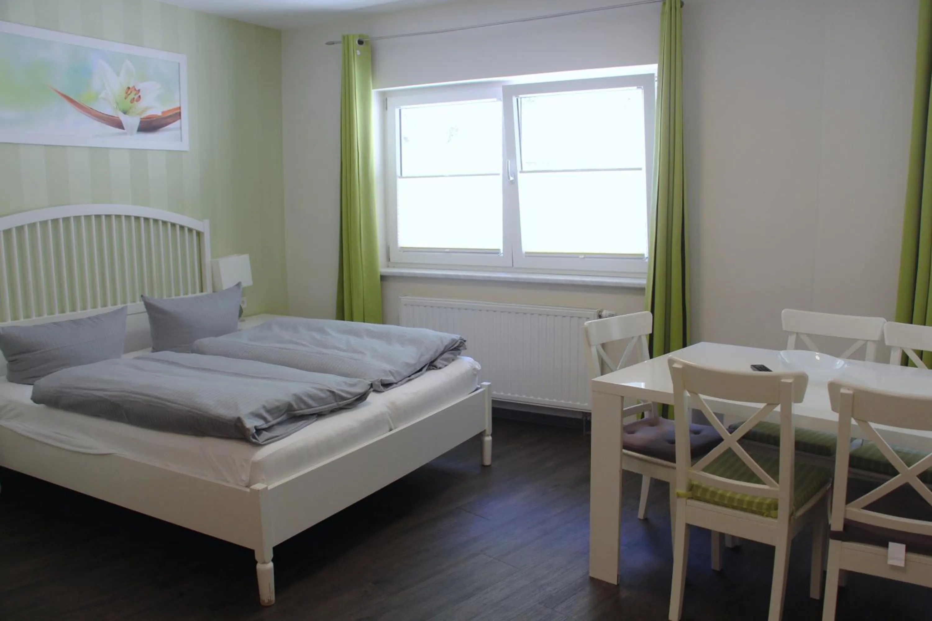 Photo of the whole room, Bed in REGIOHOTEL Schanzenhaus Wernigerode