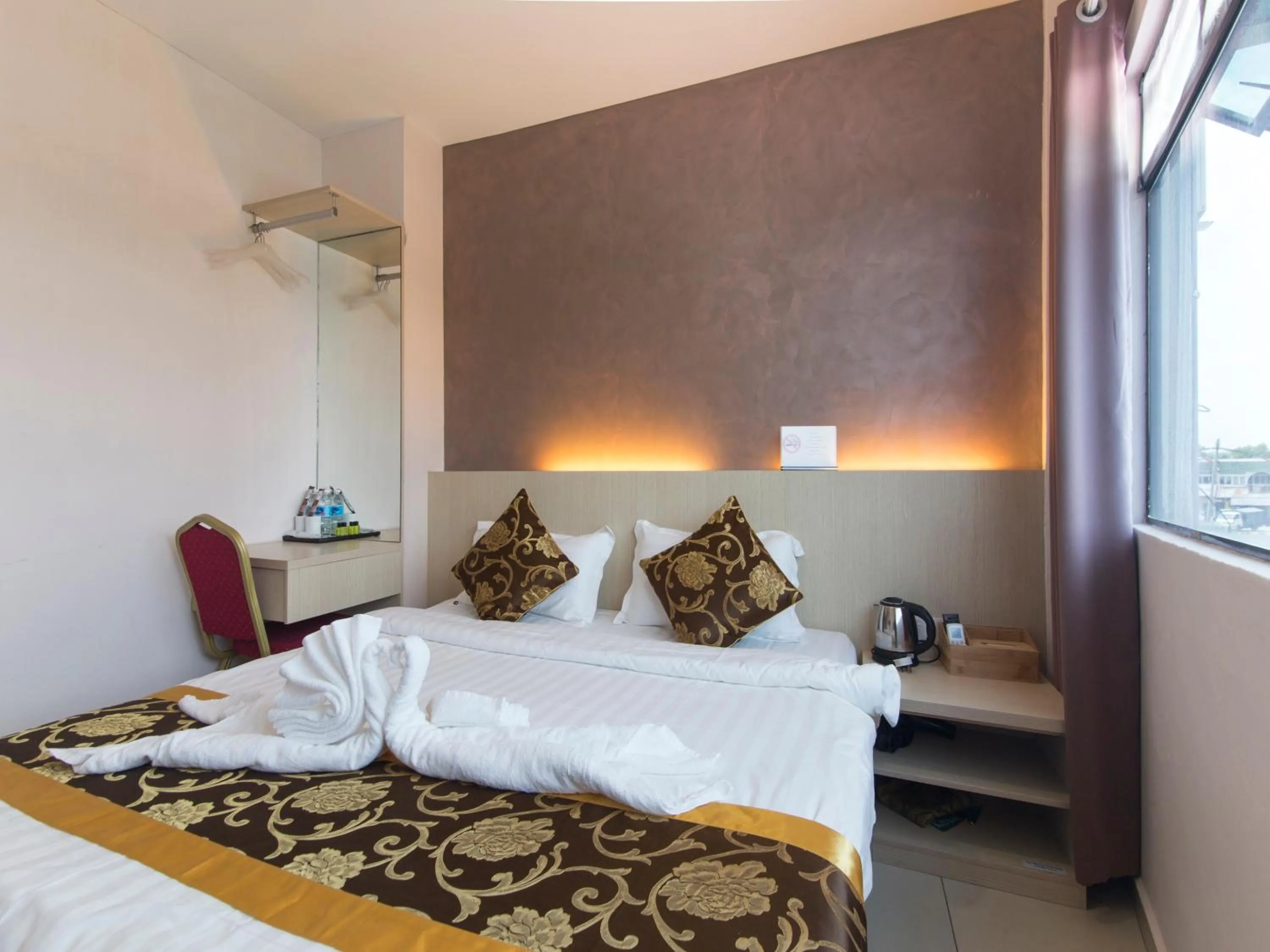 Bed in Top Garden Hotel