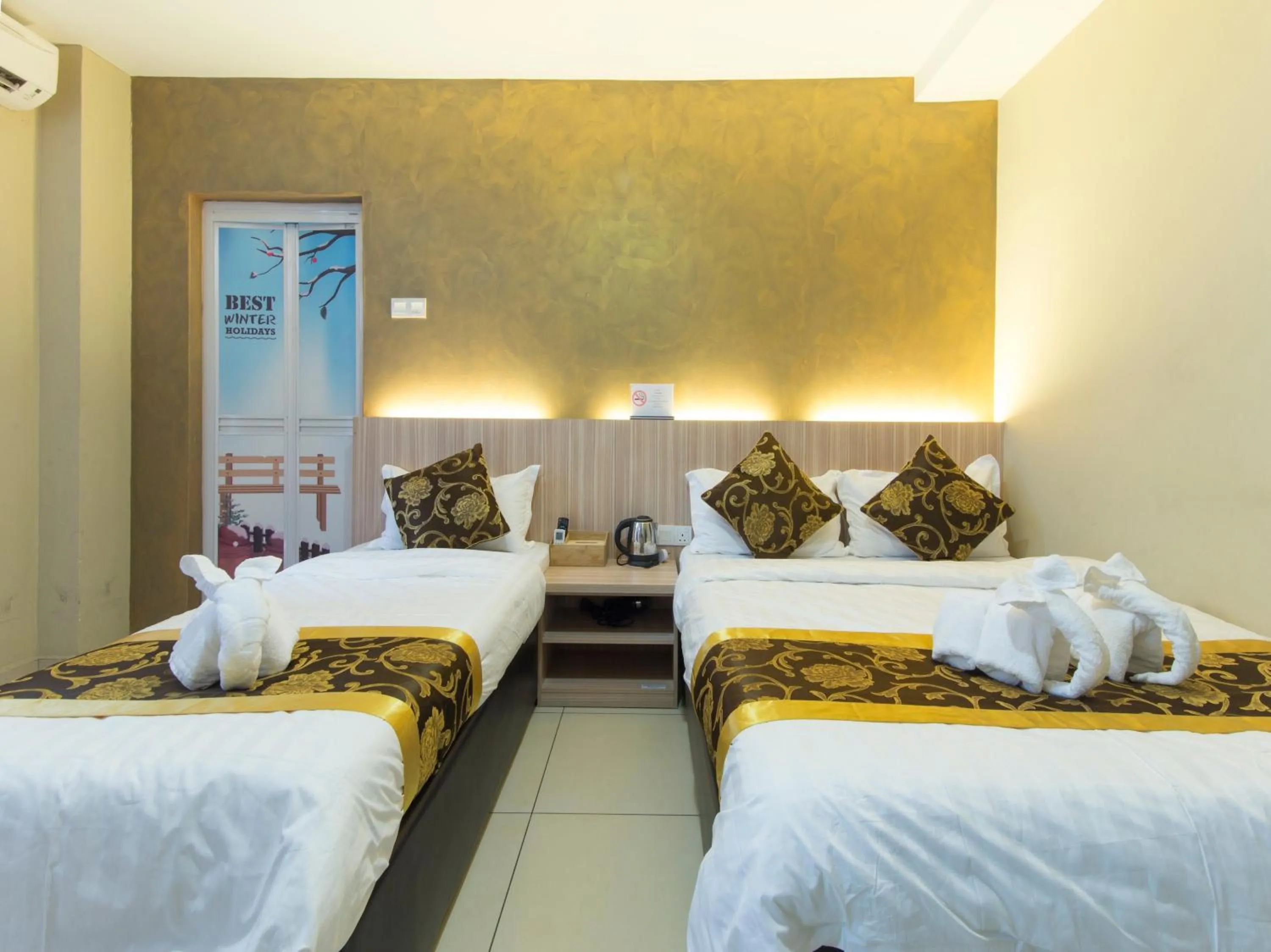 Bed in Top Garden Hotel