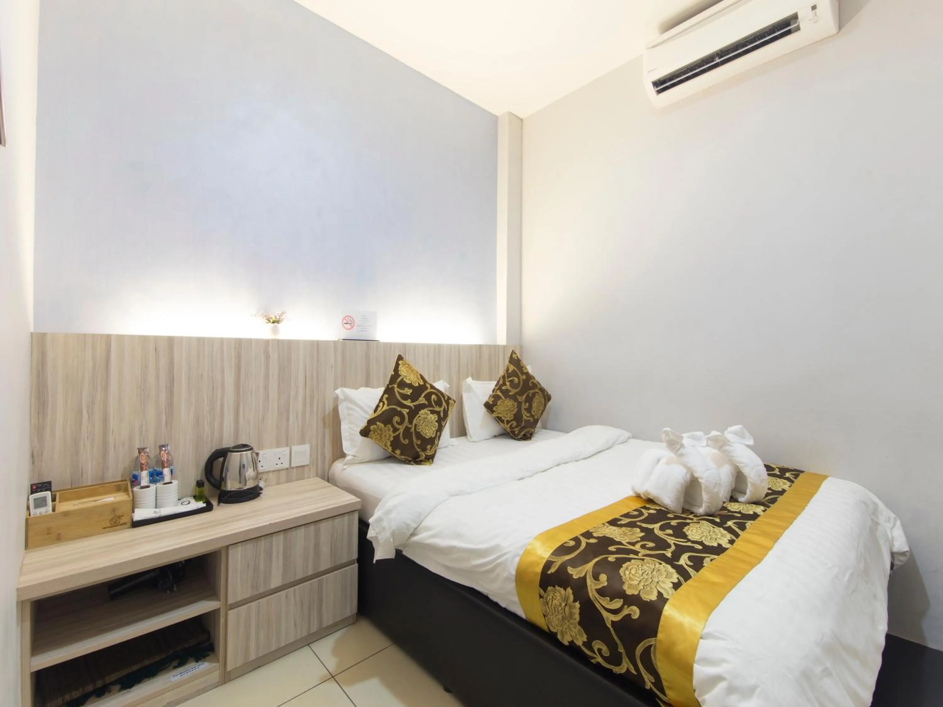 Bed in Top Garden Hotel