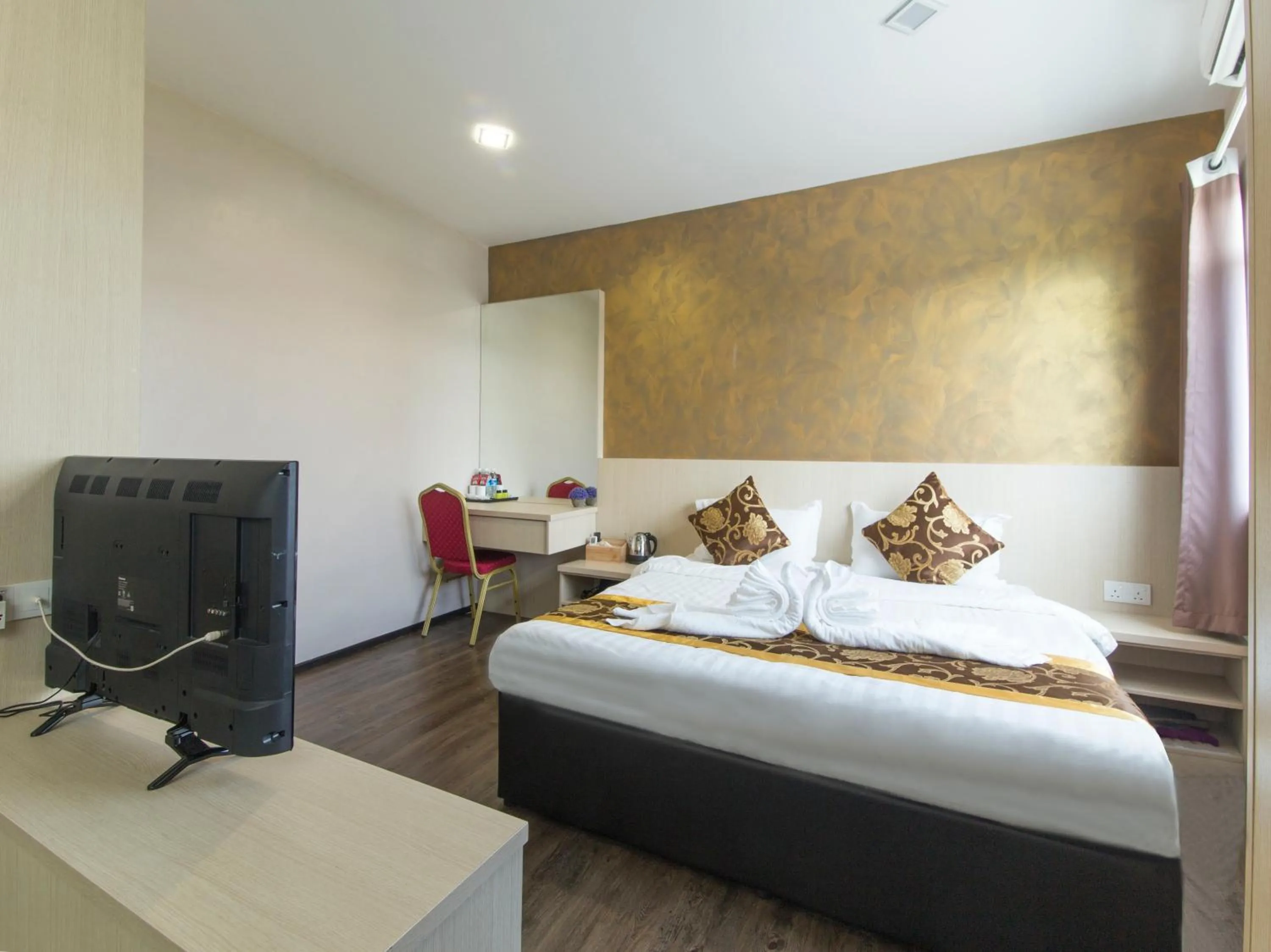 Bed in Top Garden Hotel