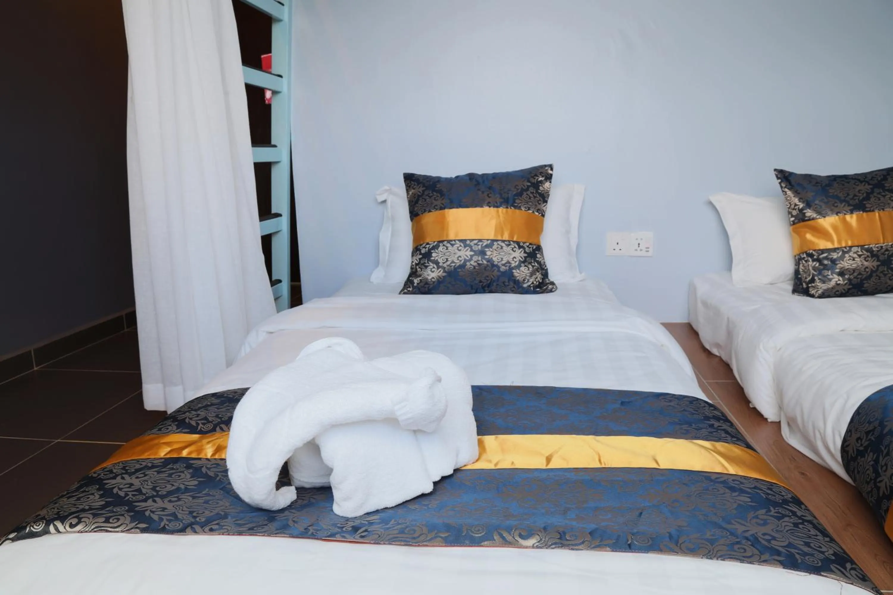 Bed in Top Garden Hotel