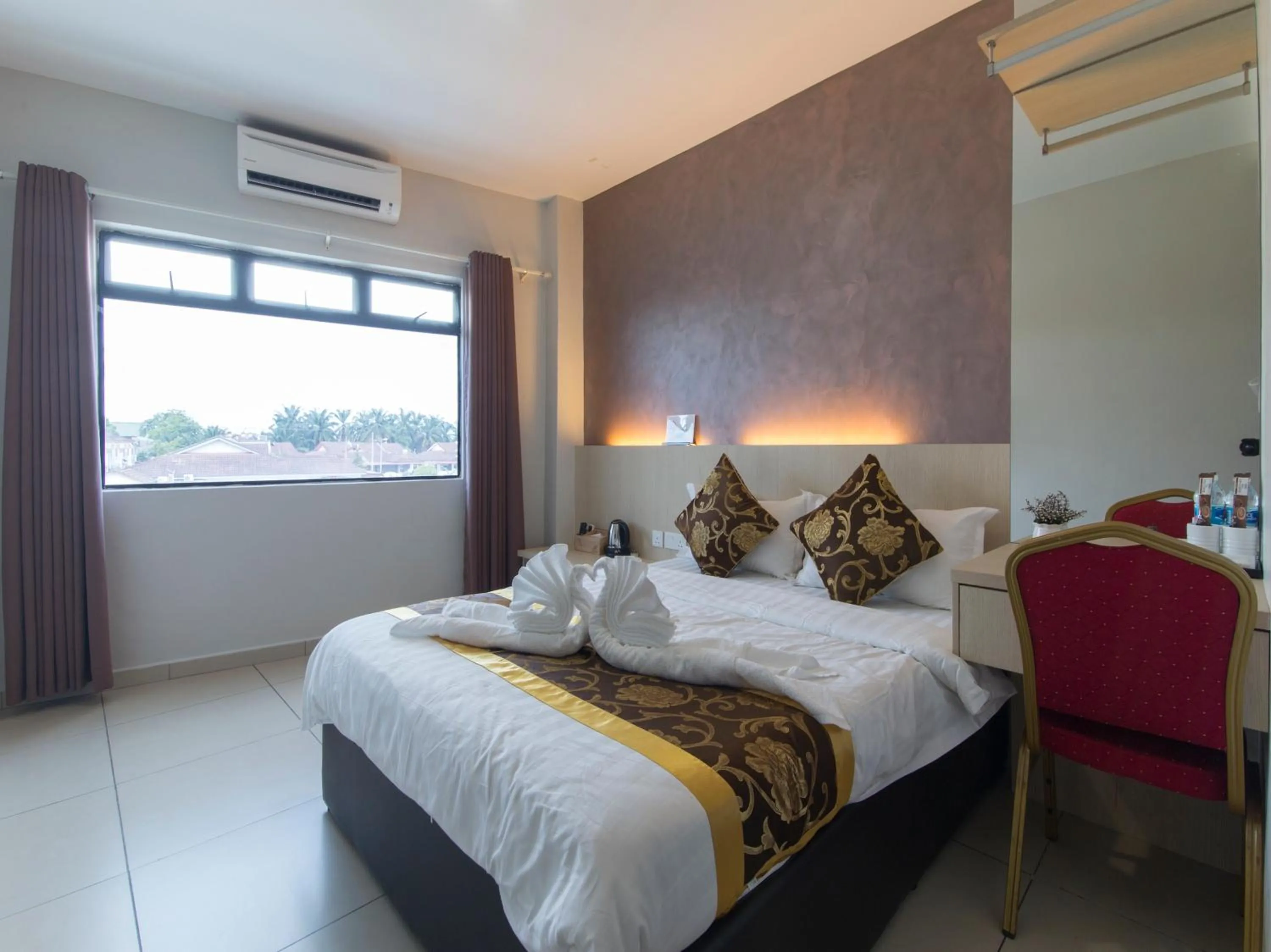 Bed in Top Garden Hotel