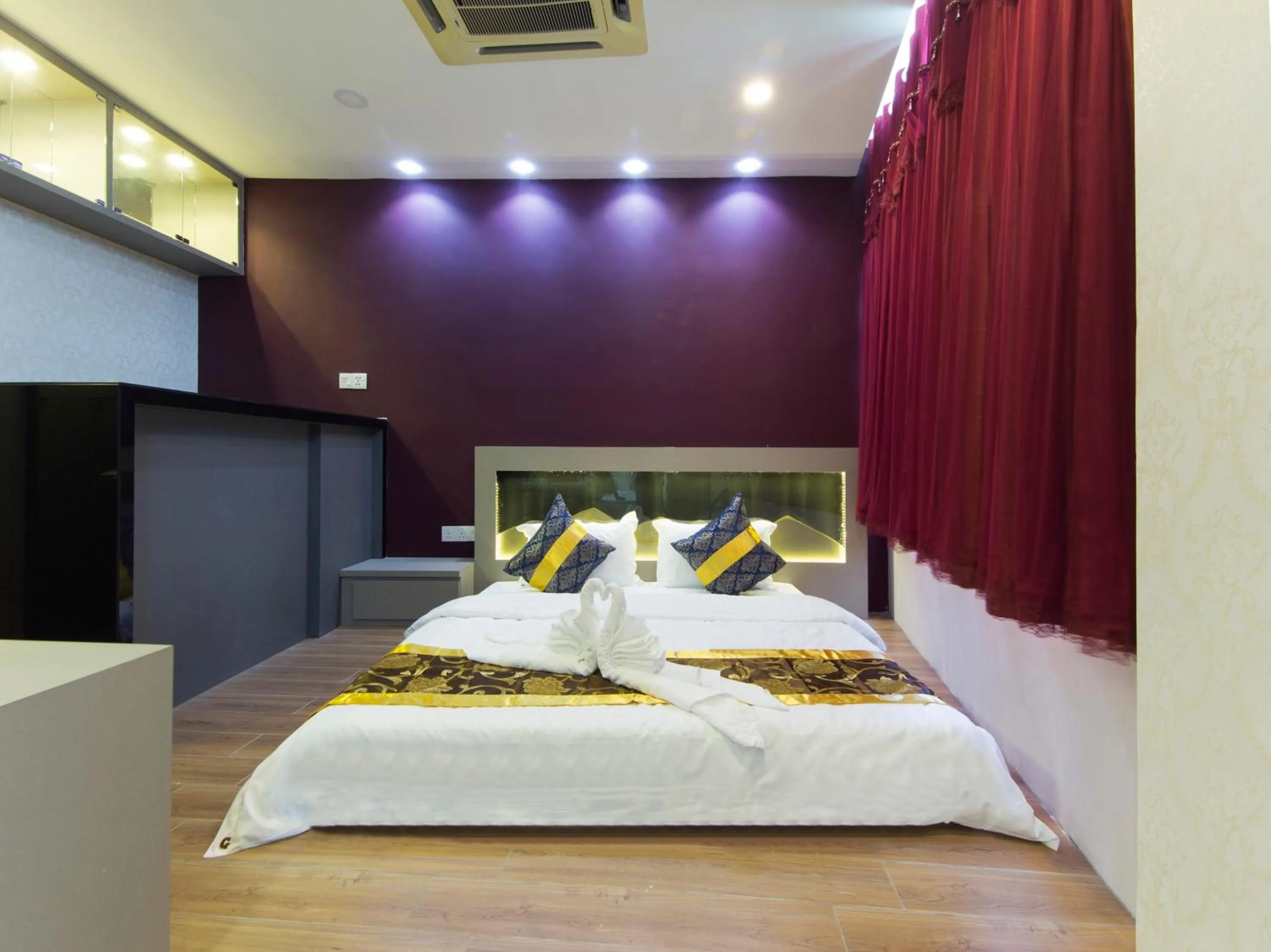 Bed in Top Garden Hotel