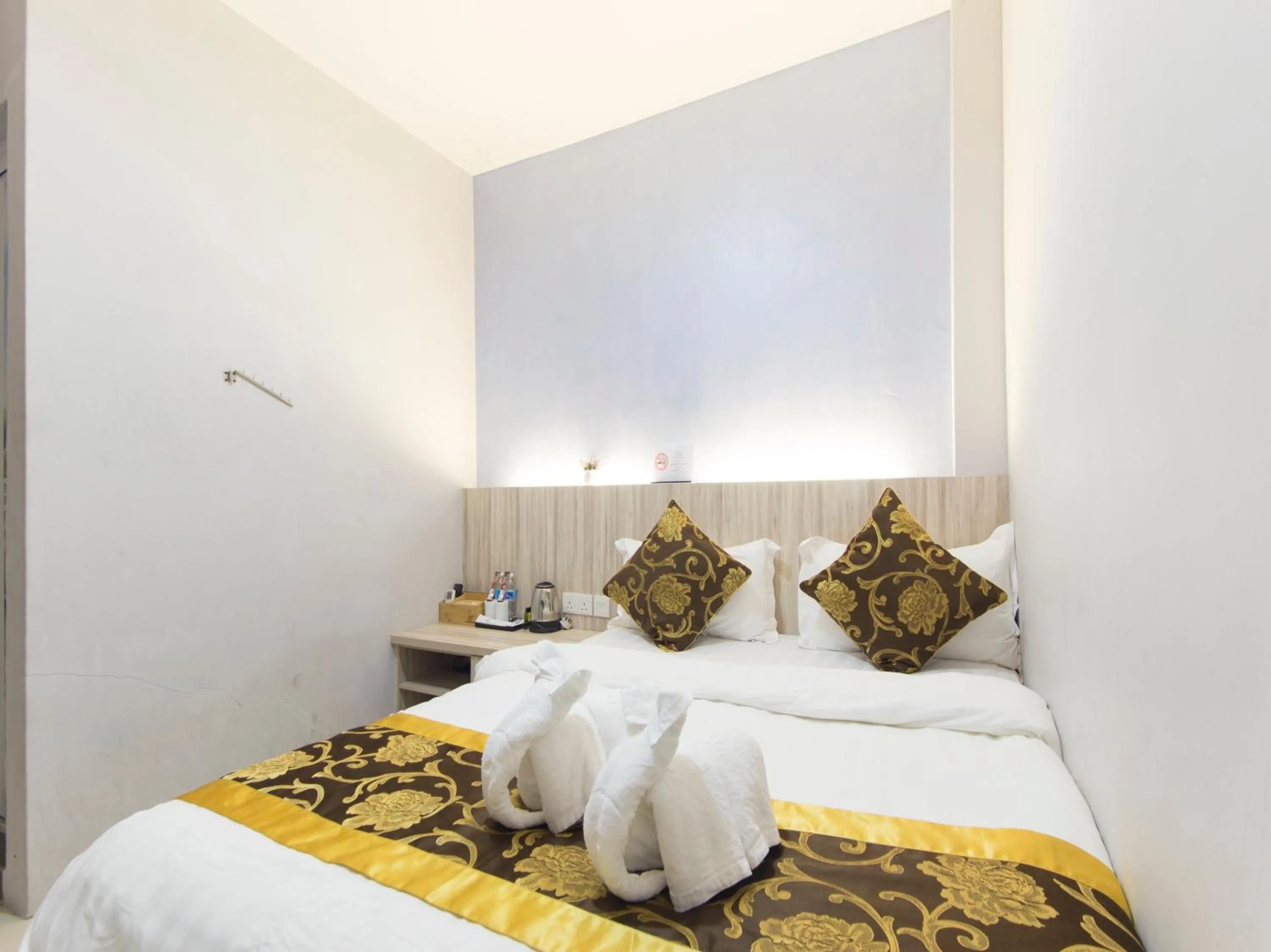 Bed in Top Garden Hotel