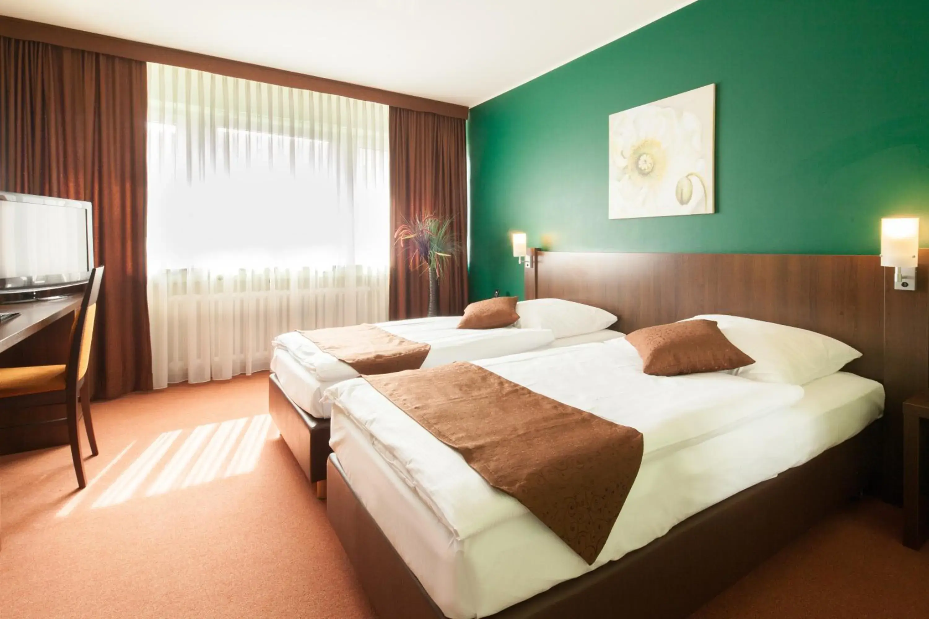 Comfort Quadruple Room in Hotel Mondial Comfort Quadruple Room in Hotel Mondial