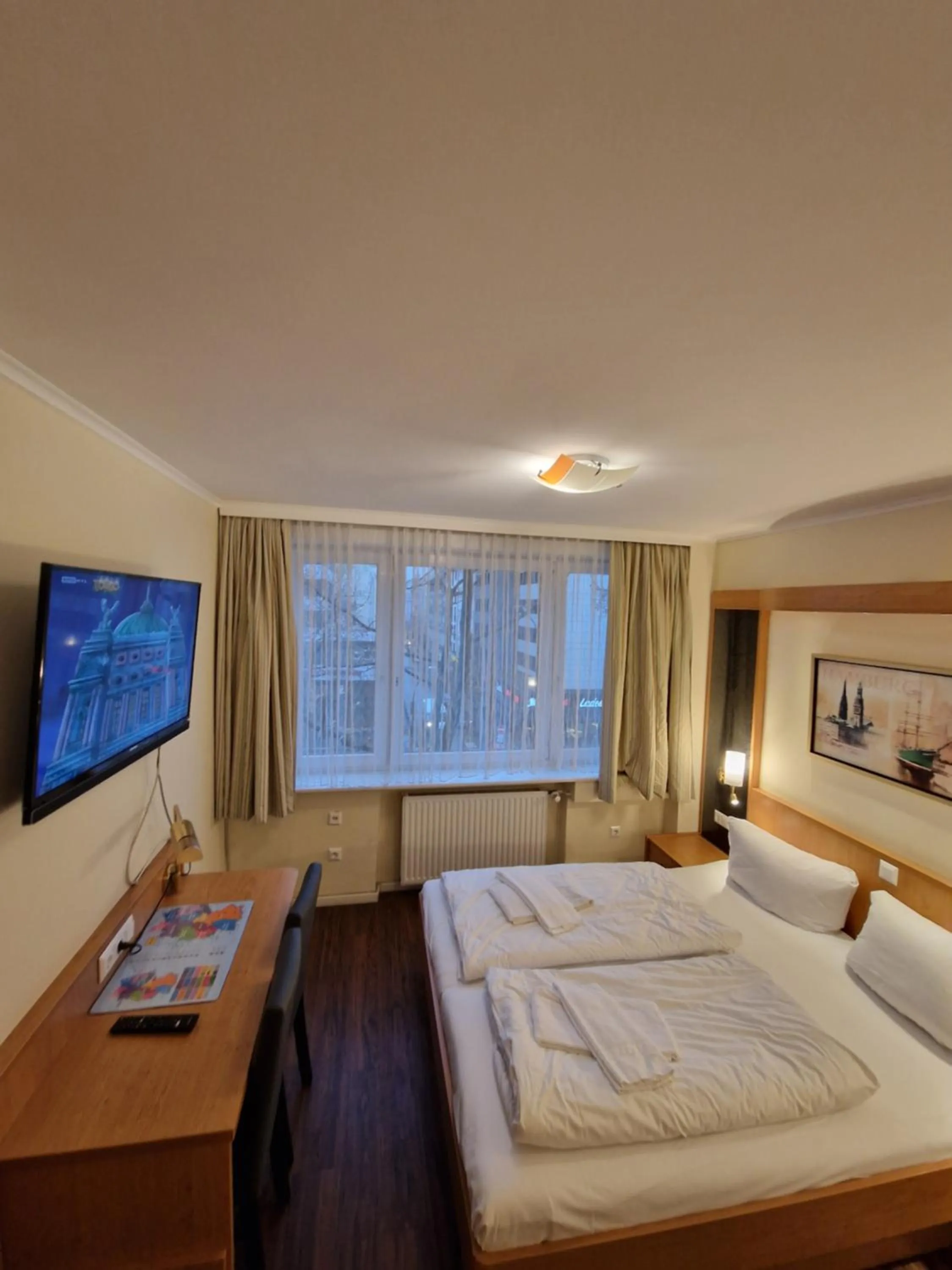 Bed in Hotel Wikinger Hof