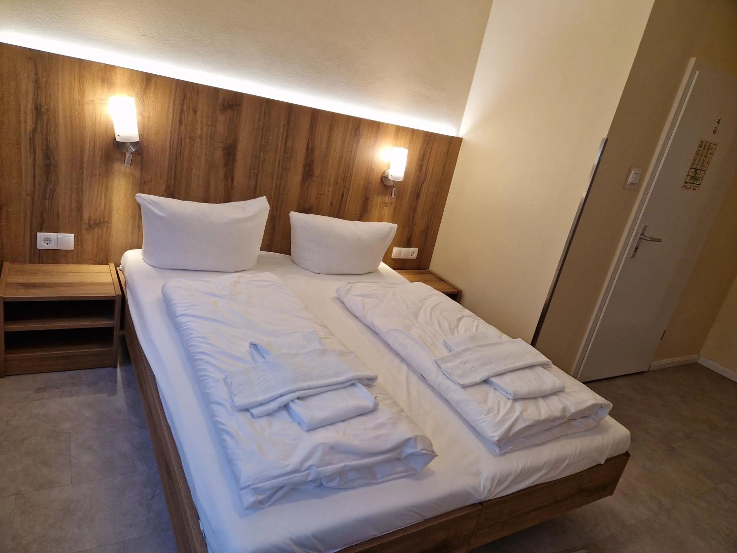 Bed in Hotel Wikinger Hof