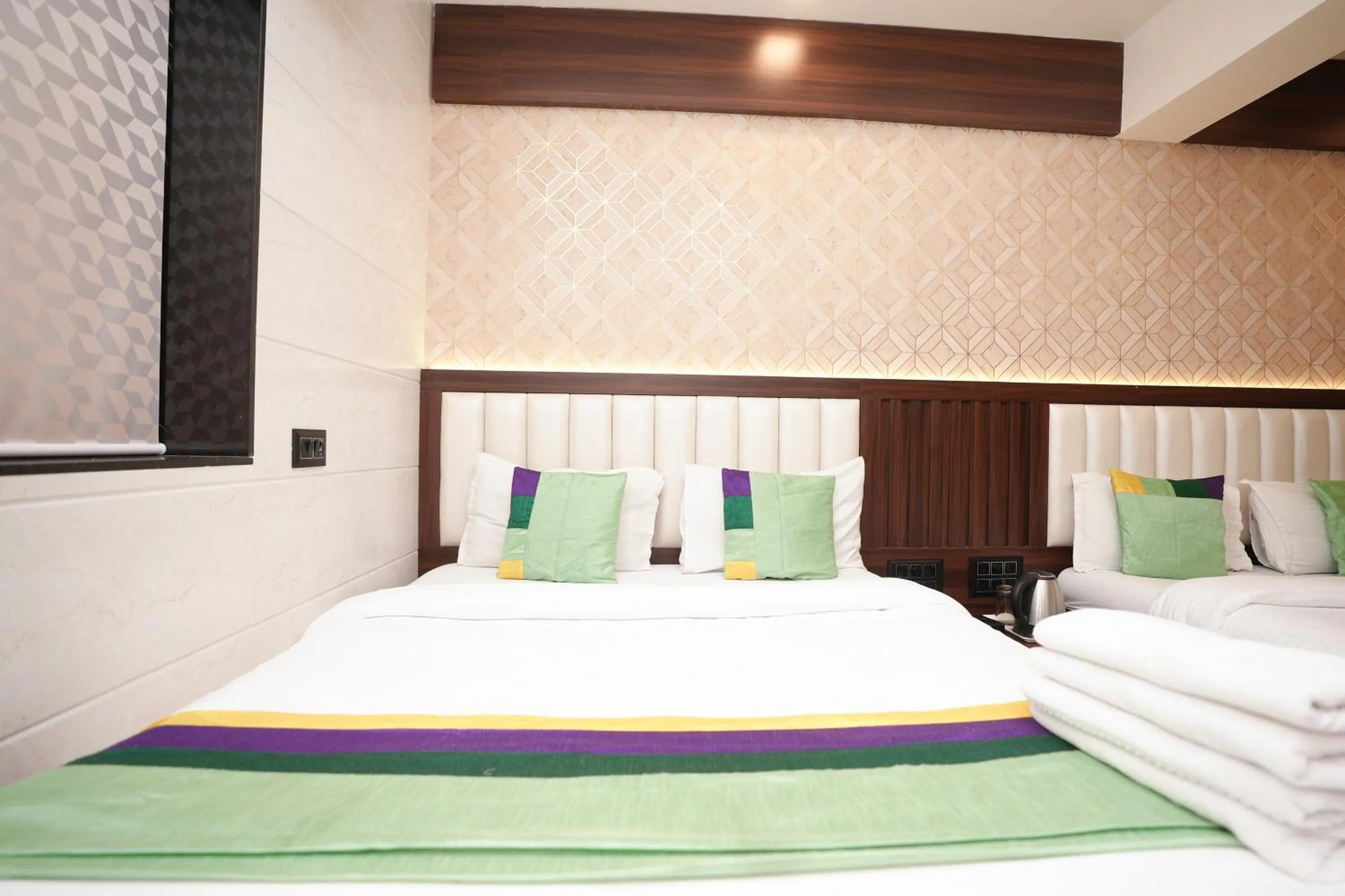 Bed in Hotel Neelkiran