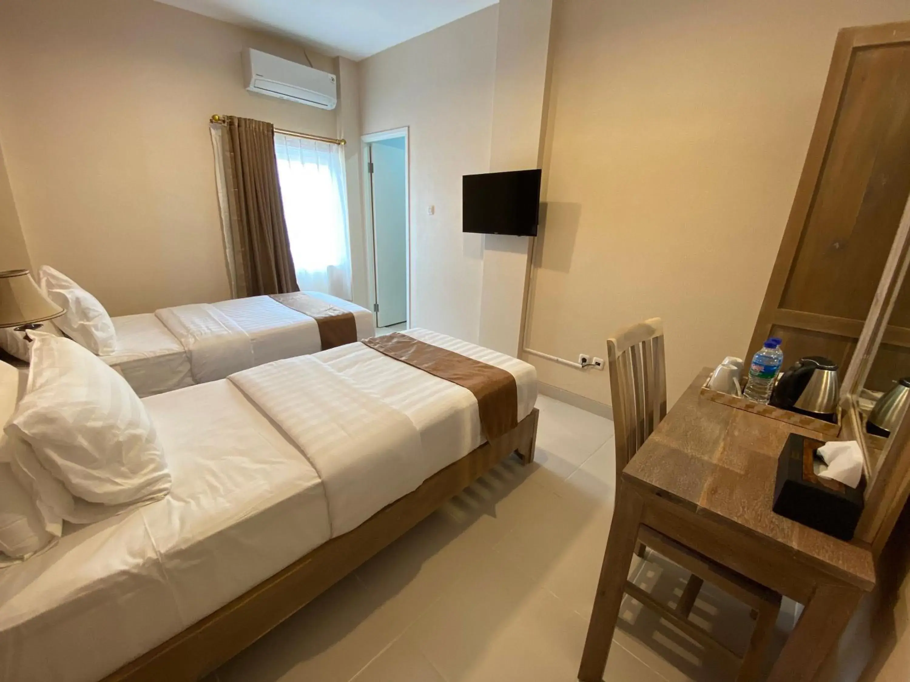 Bed in Flamingo Avia Labuan Bajo Bed in Flamingo Avia Labuan Bajo