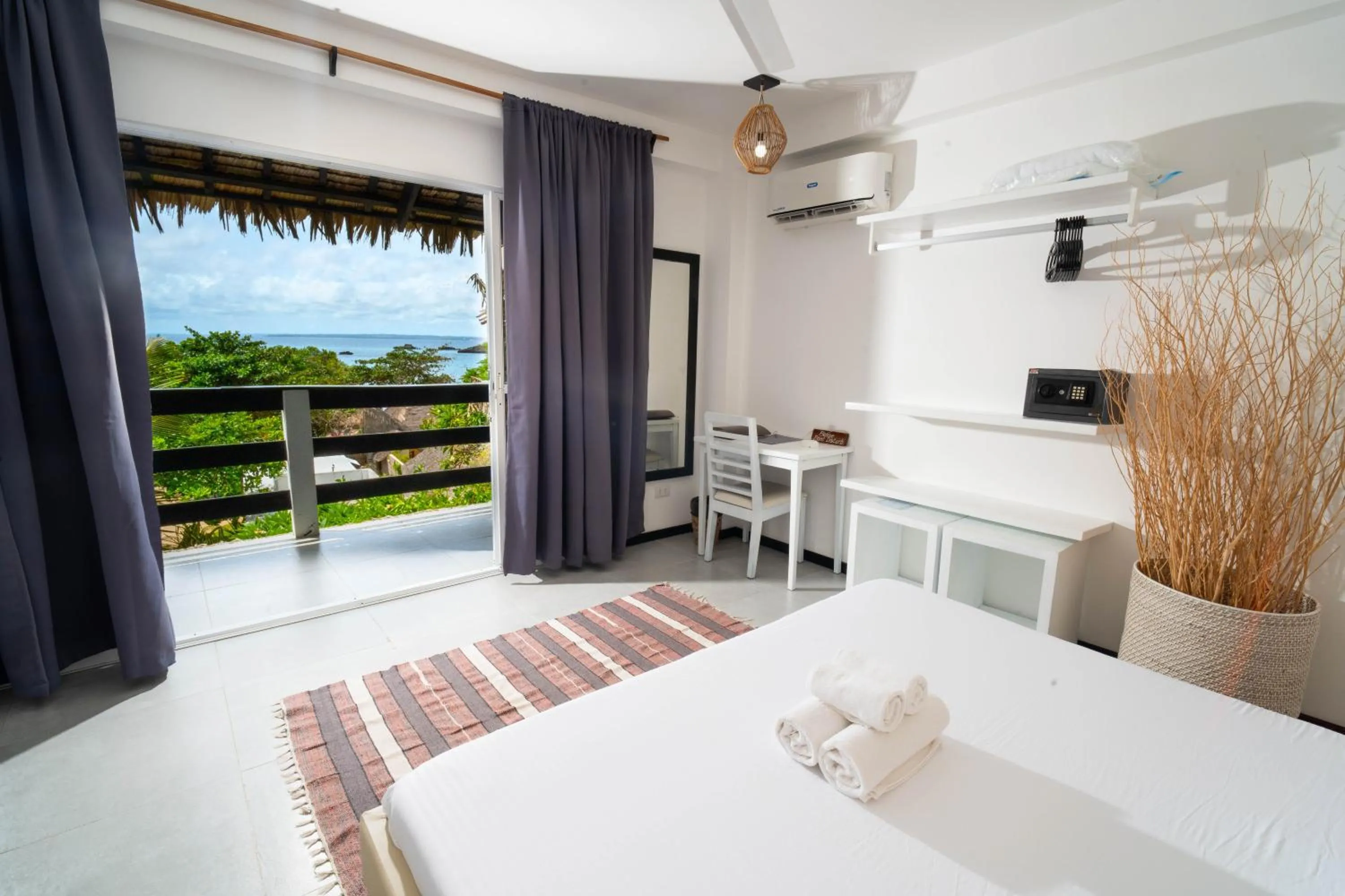 View (from property/room), Bed in Blanco Beach Resort Malapascua