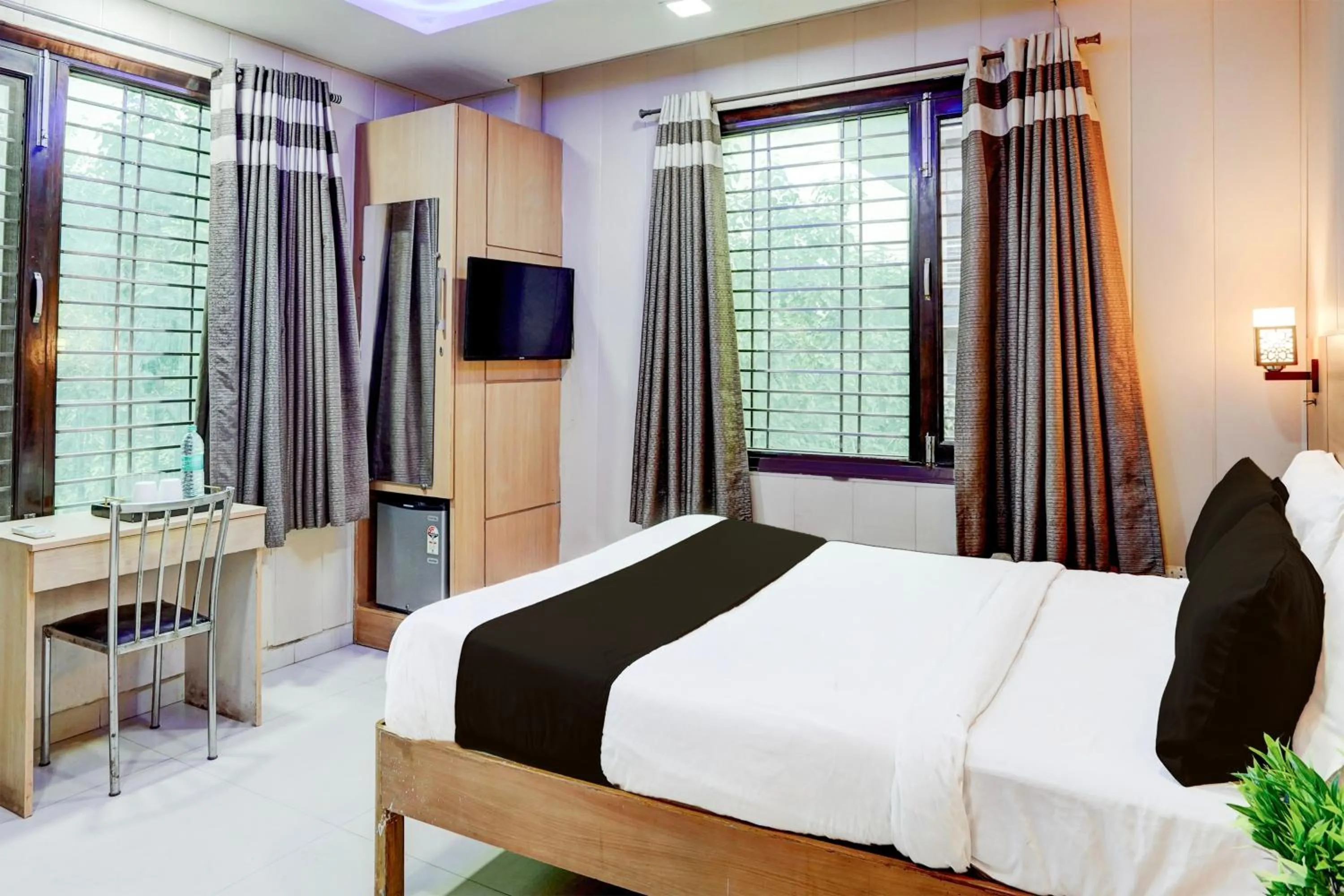 Bedroom, Bed in Super Hotel O Rohini Sector 24