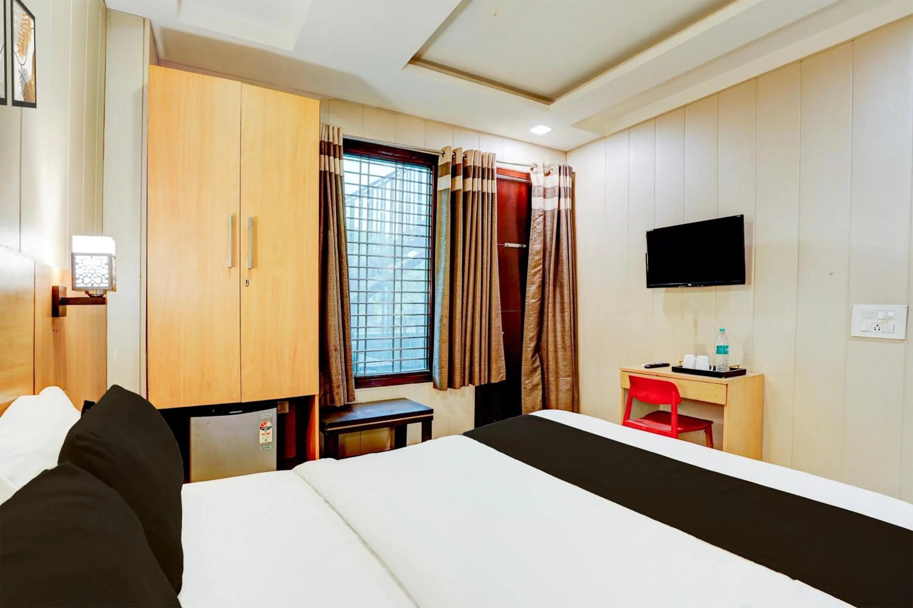 Bedroom, Bed in Super Hotel O Rohini Sector 24