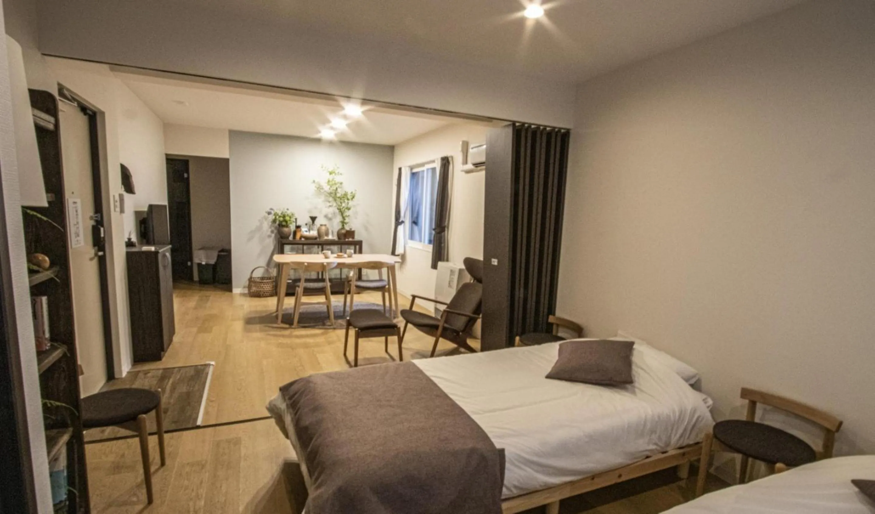 Photo of the whole room, Bed in UCHI Susukino 5.7