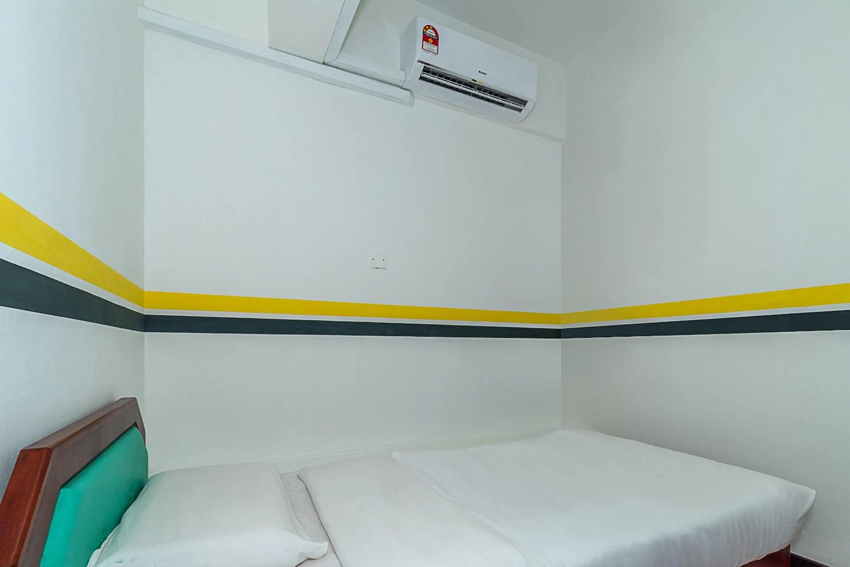 Bedroom in SPOT ON 89936 Sutera Inn