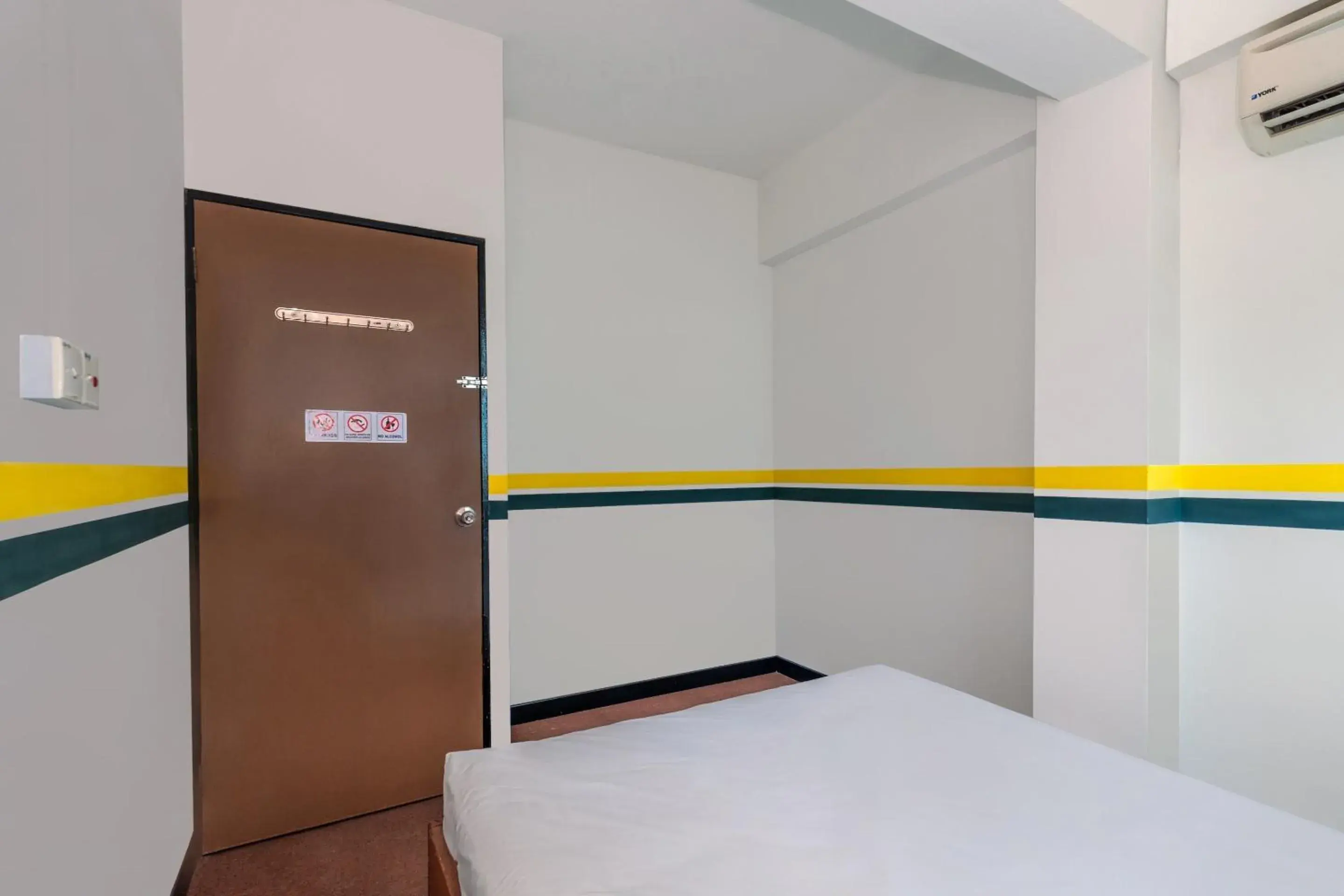 Bedroom in SPOT ON 89936 Sutera Inn