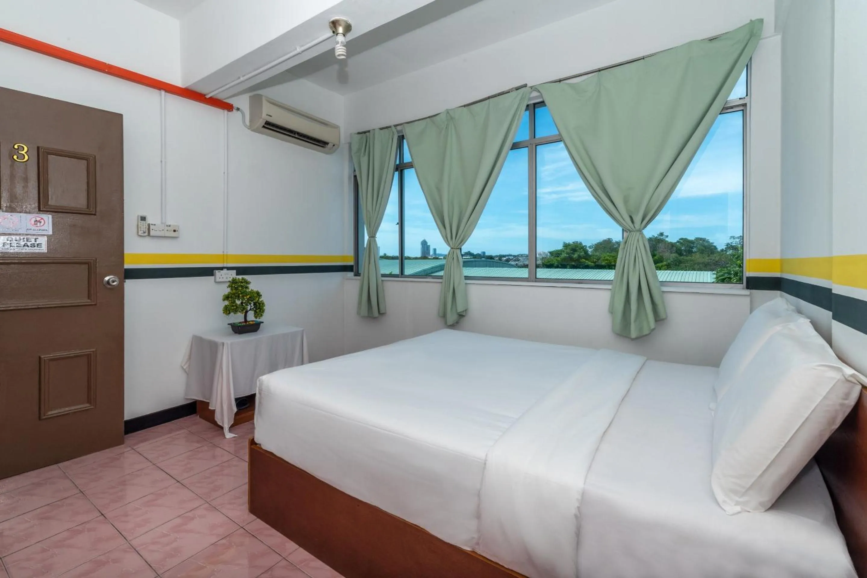 Bedroom in SPOT ON 89936 Sutera Inn