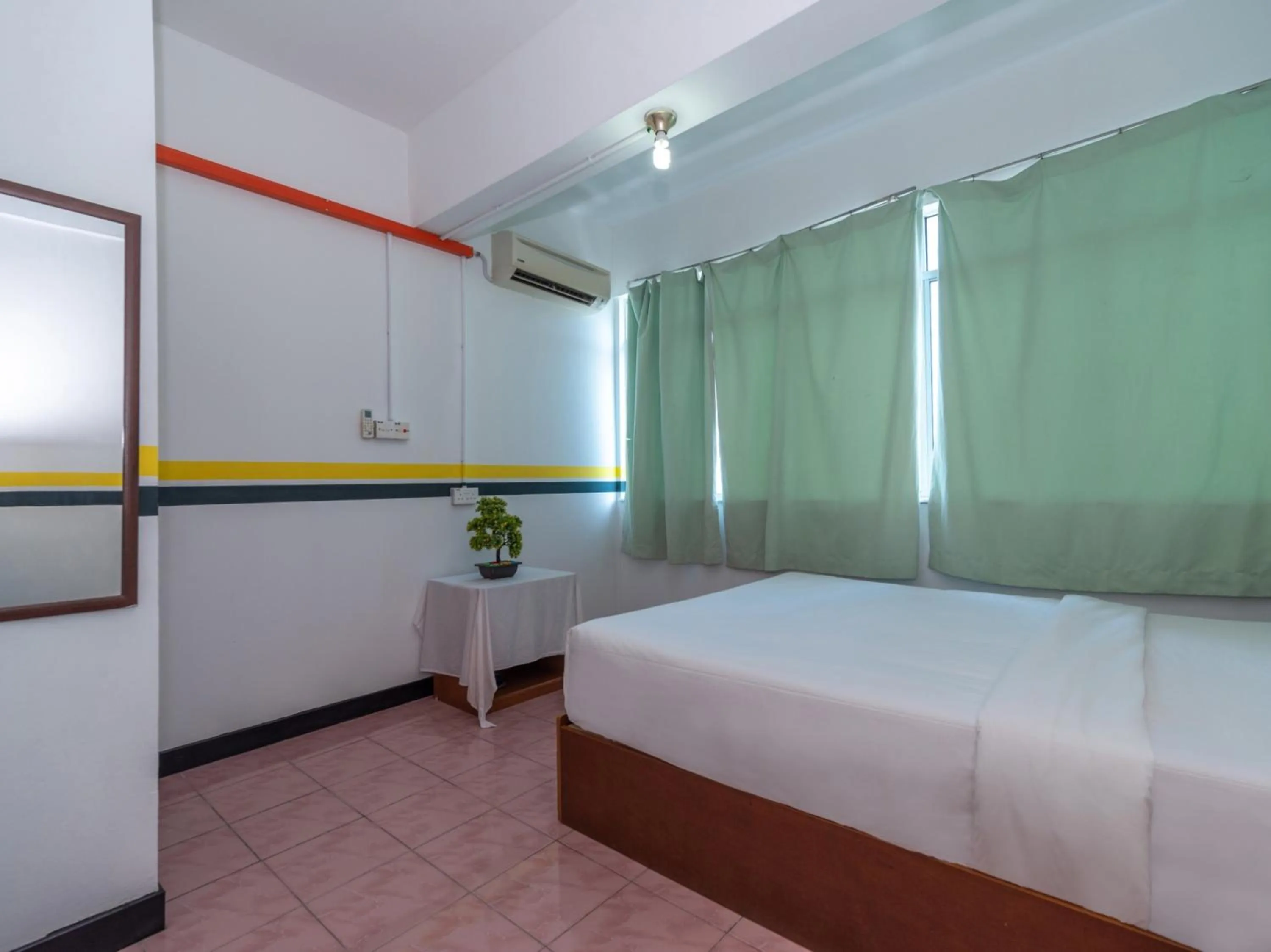 Bedroom in SPOT ON 89936 Sutera Inn