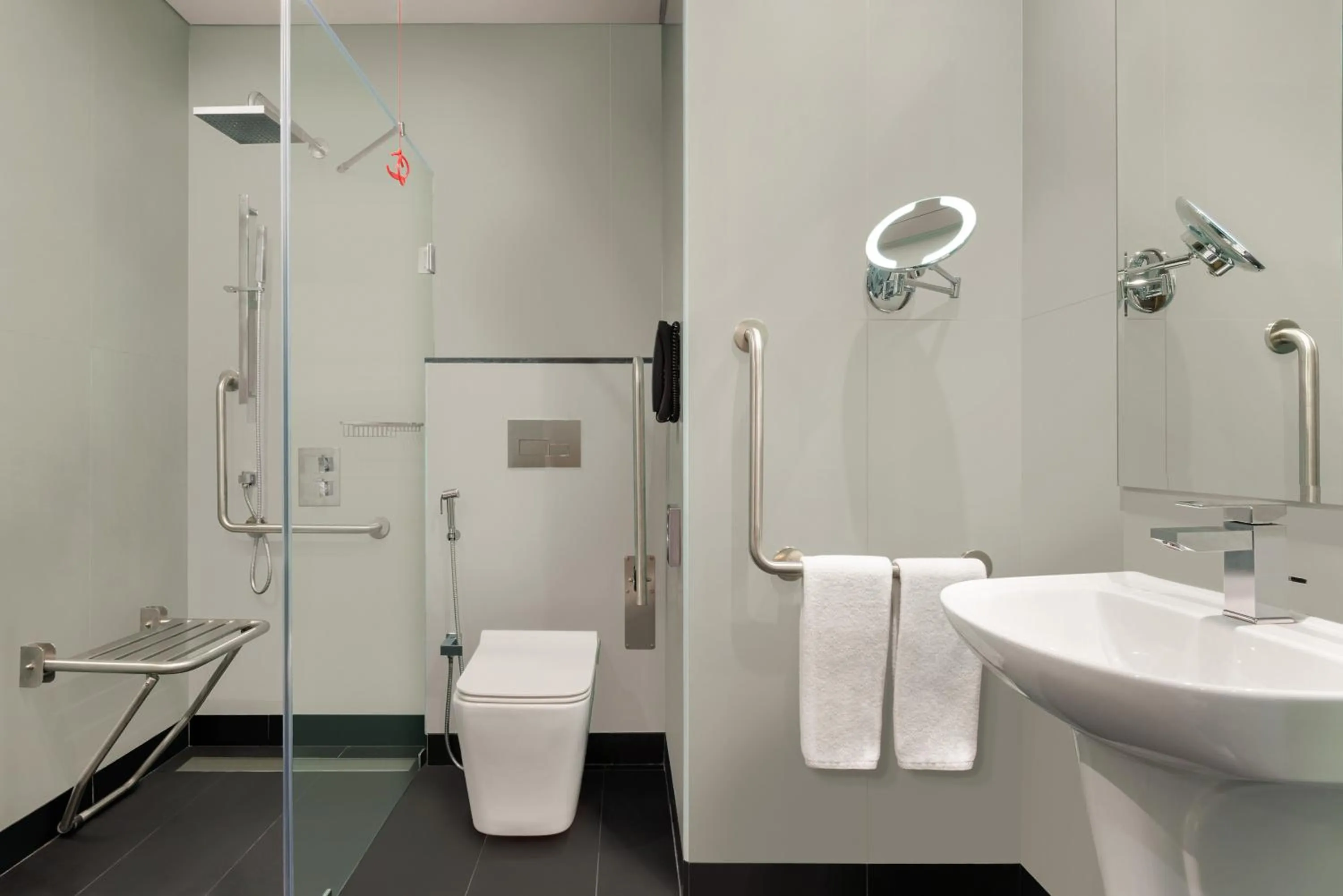 Shower in Ramada Encore by Wyndham Muscat Al-Ghubra