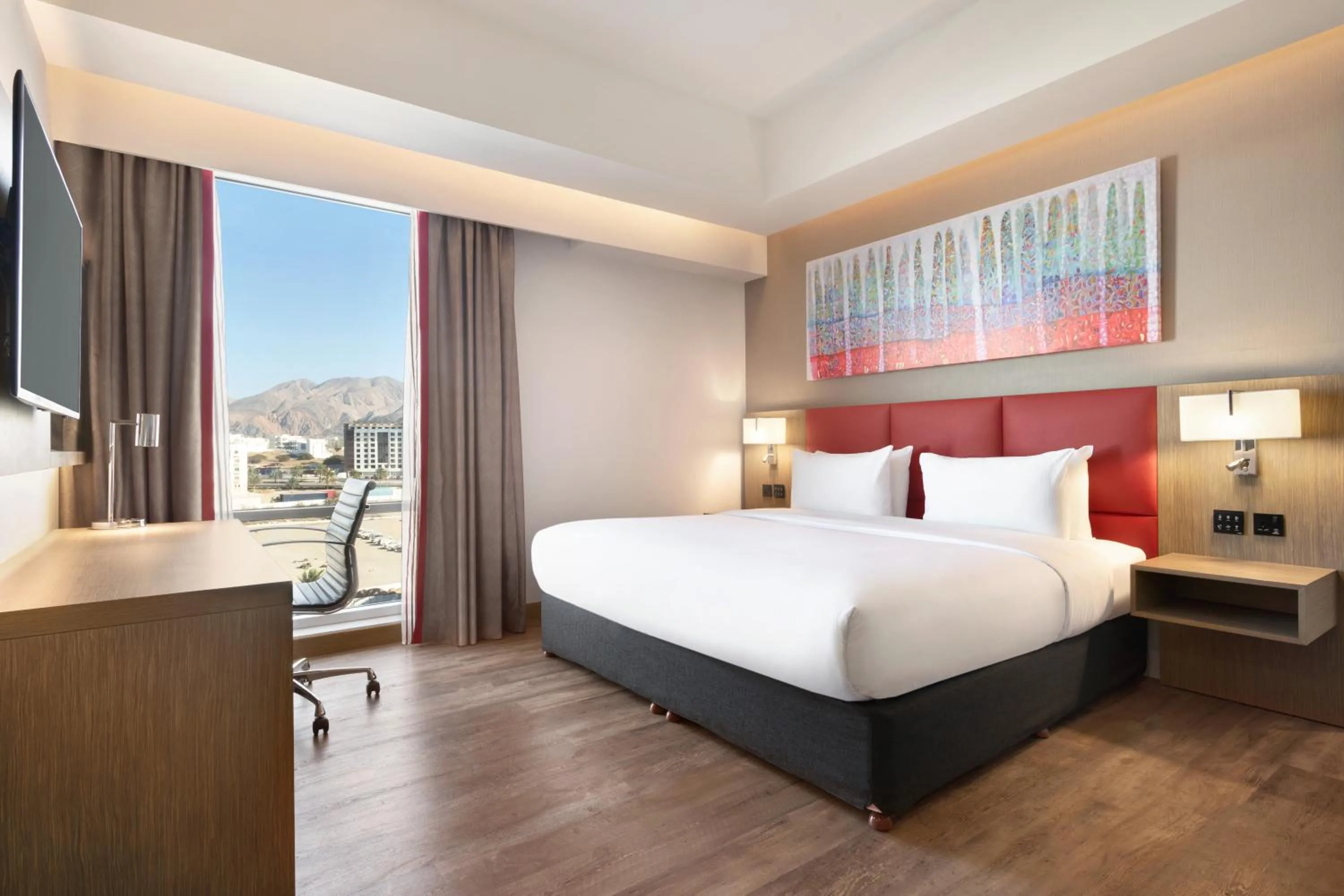 Mountain view, Bed in Ramada Encore by Wyndham Muscat Al-Ghubra