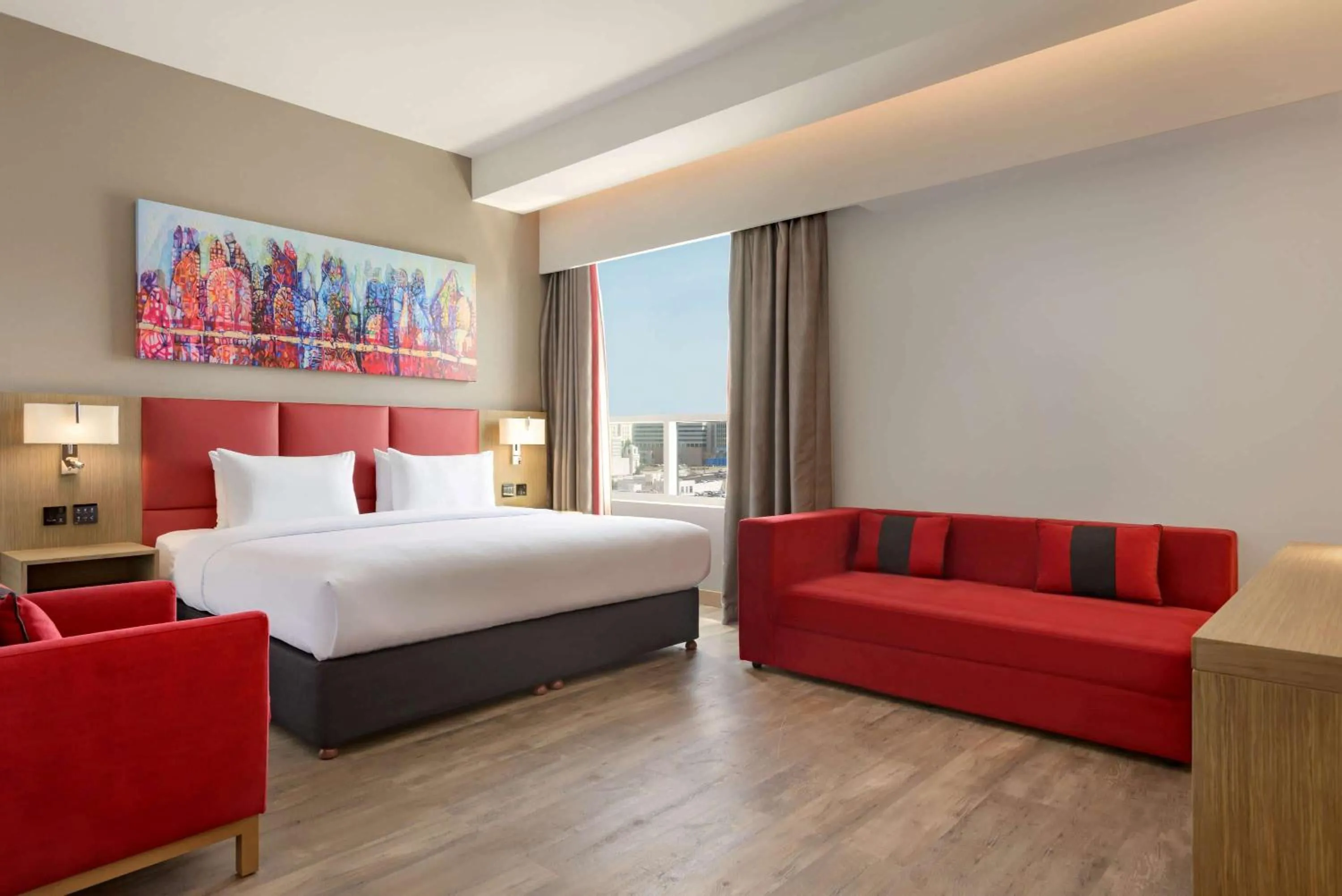 Photo of the whole room, Bed in Ramada Encore by Wyndham Muscat Al-Ghubra