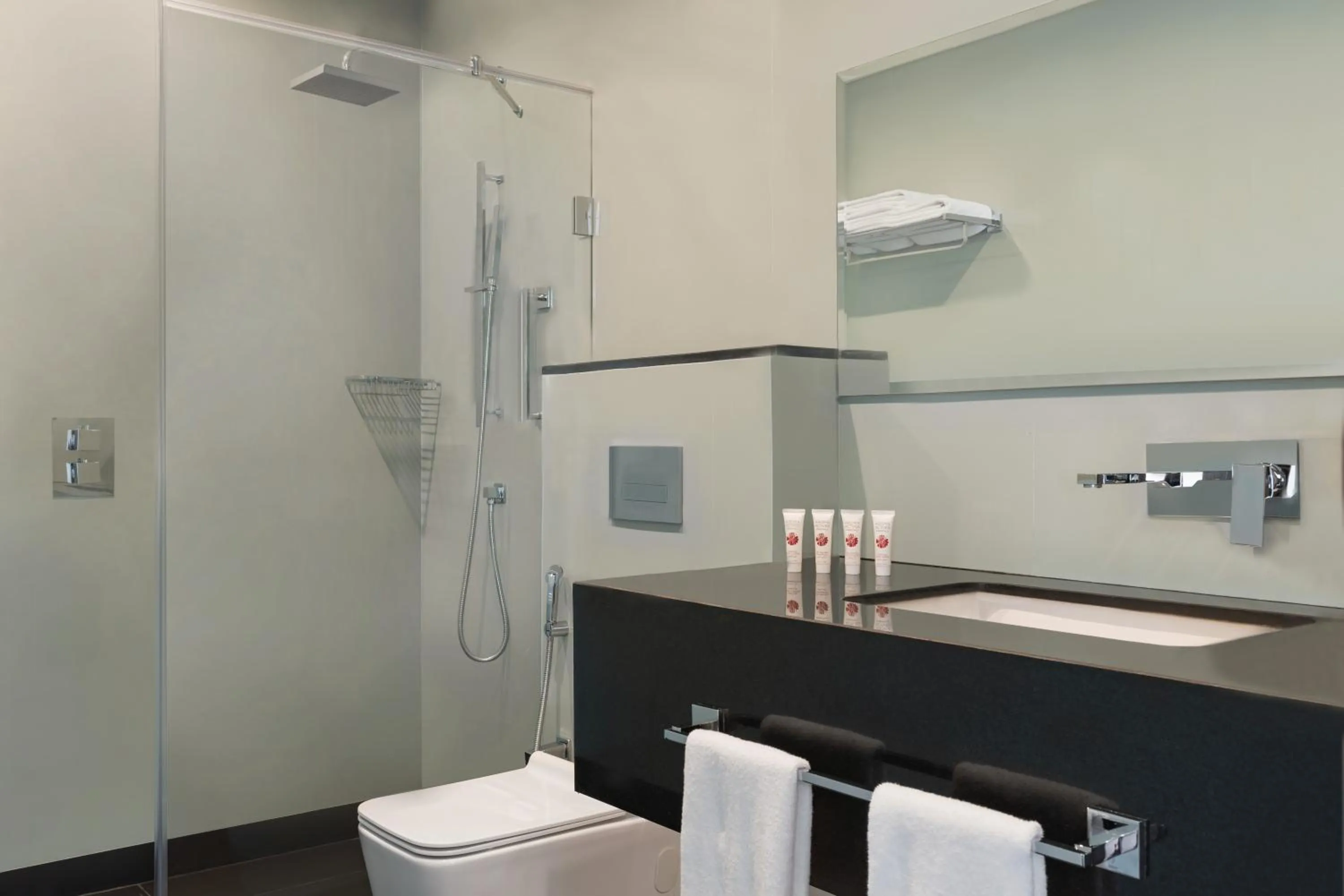 Shower in Ramada Encore by Wyndham Muscat Al-Ghubra