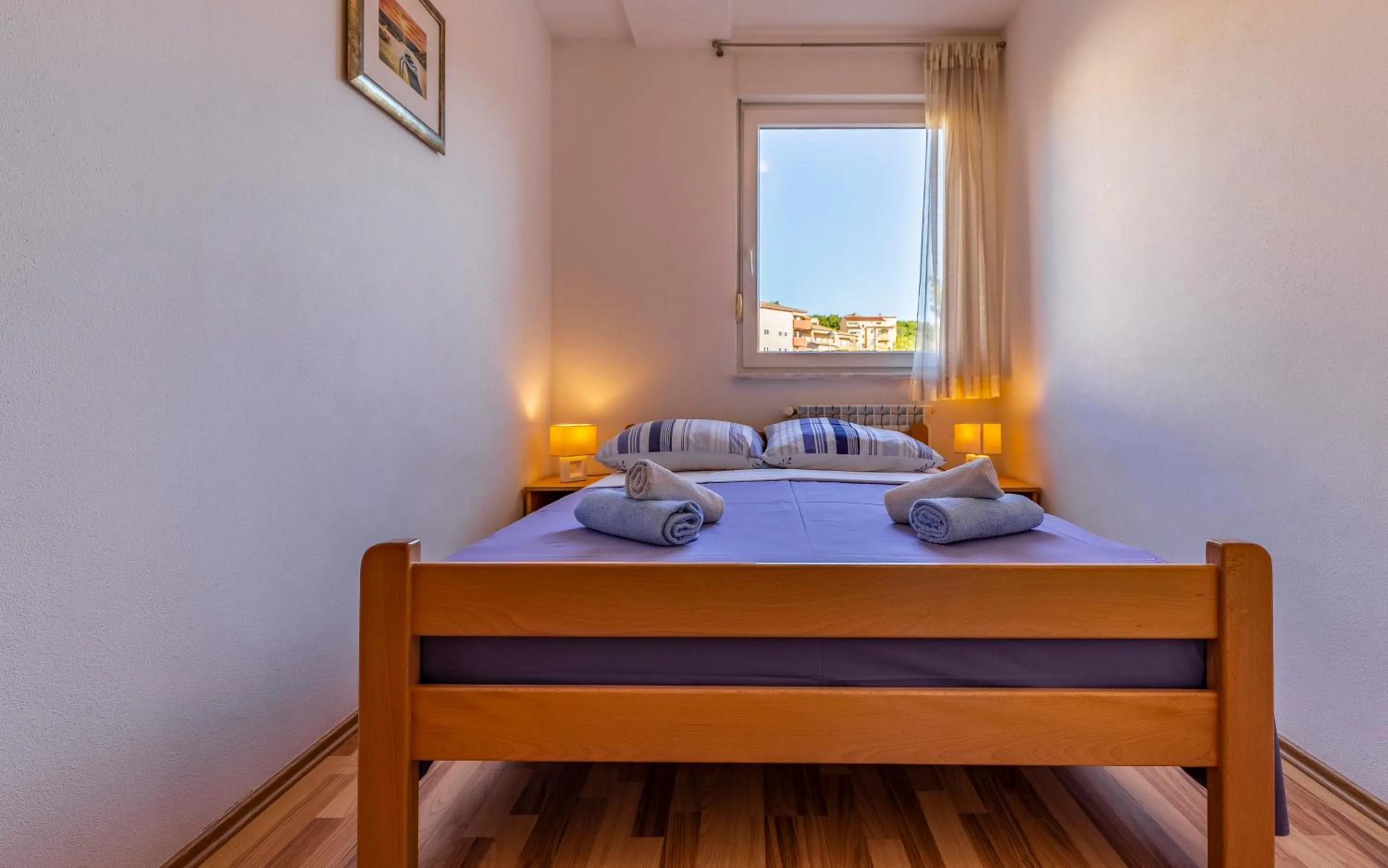 Bed in Istriensonne - Apartments Veruda mit Grillterrasse