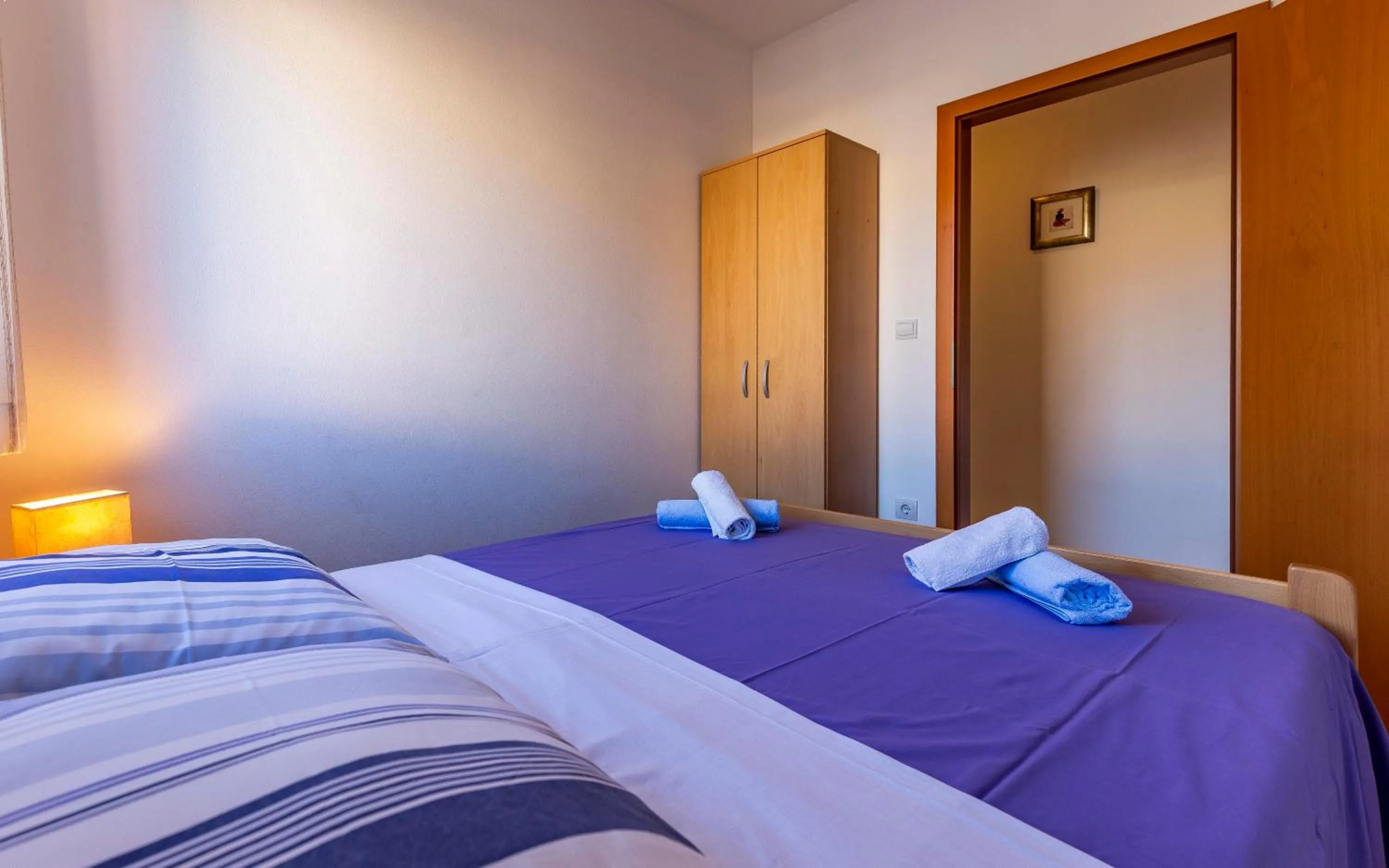 Bed in Istriensonne - Apartments Veruda mit Grillterrasse