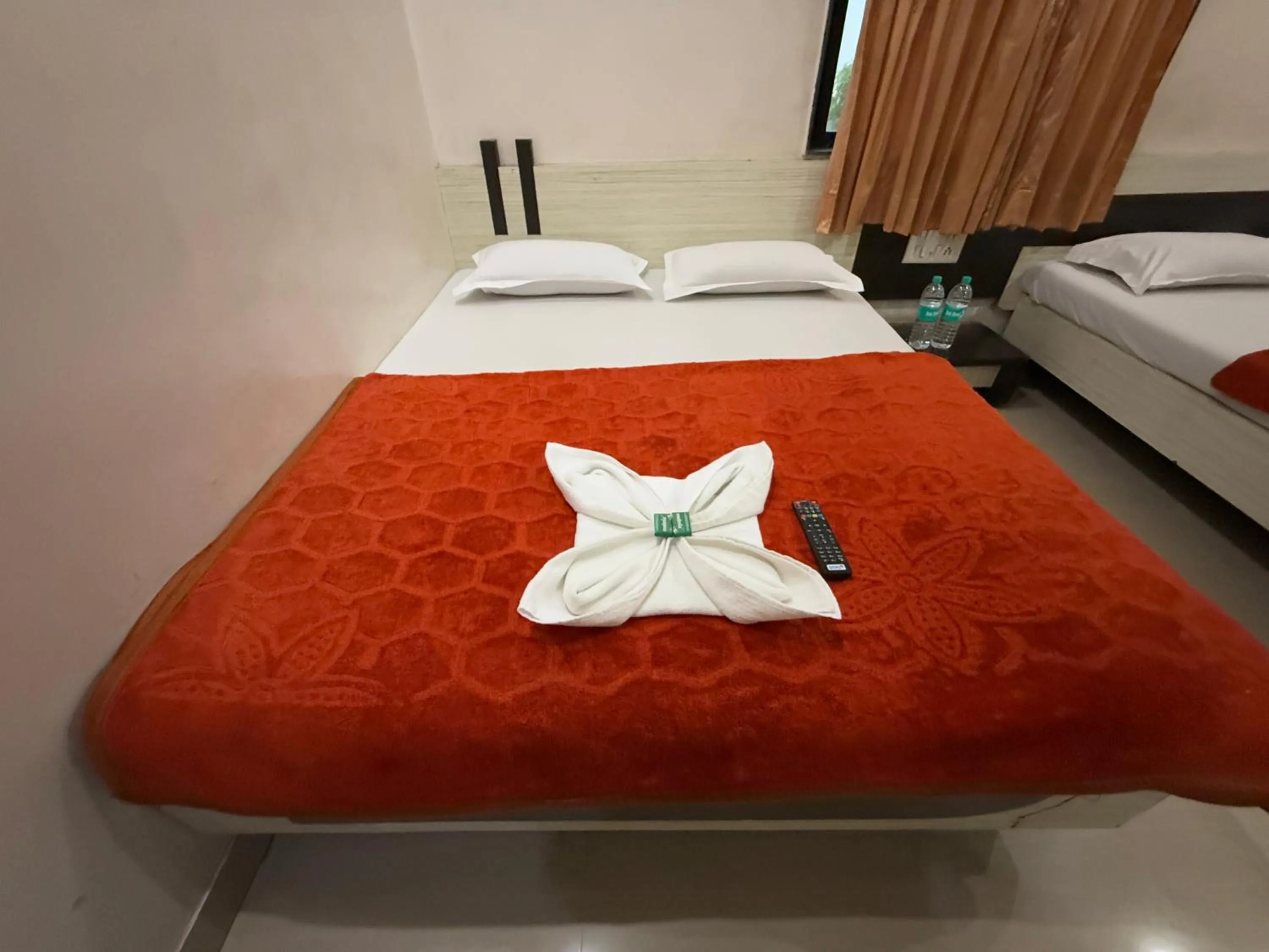 Bed in Hotel Temple Sai