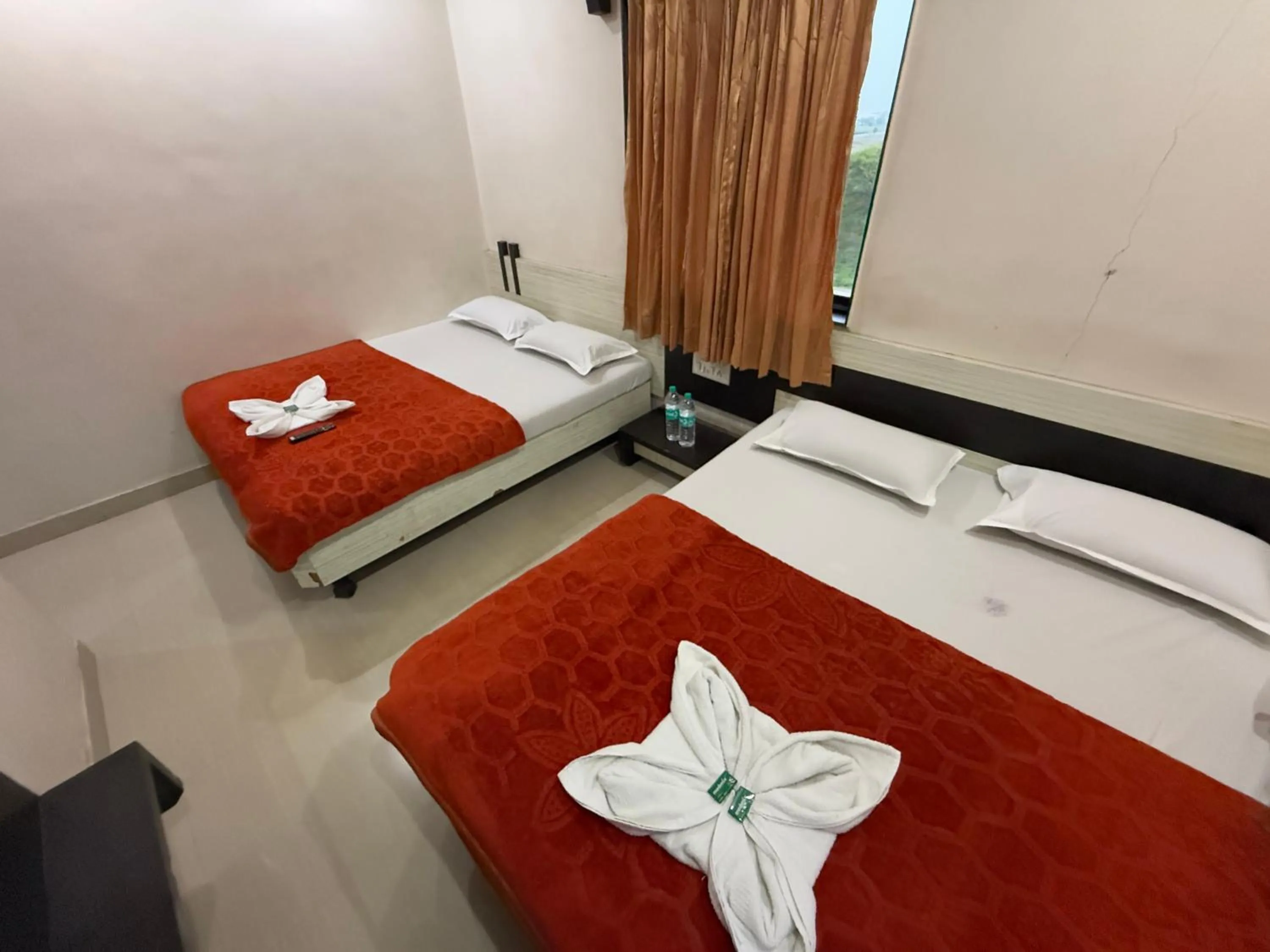 Bed in Hotel Temple Sai