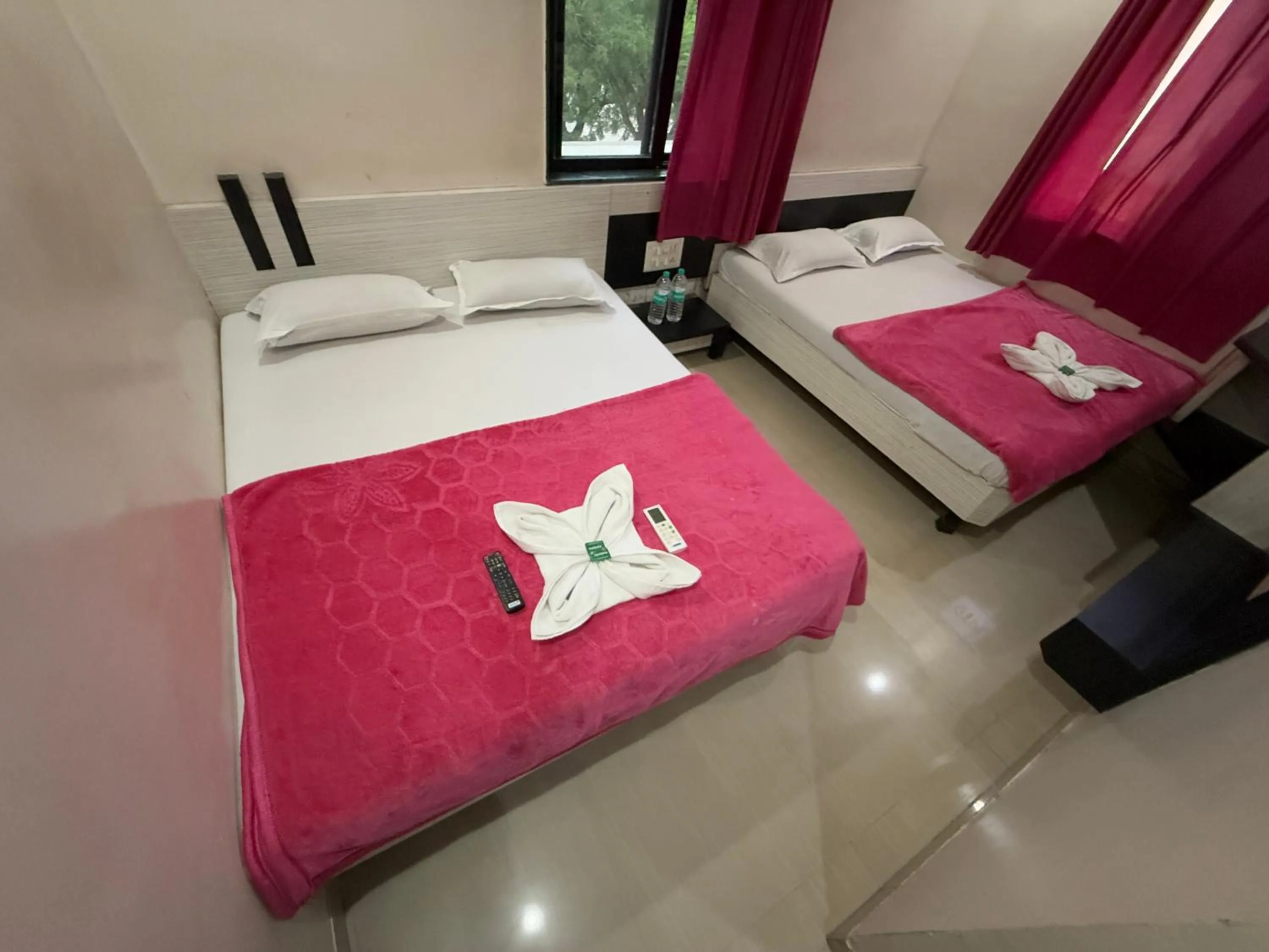 Bed in Hotel Temple Sai