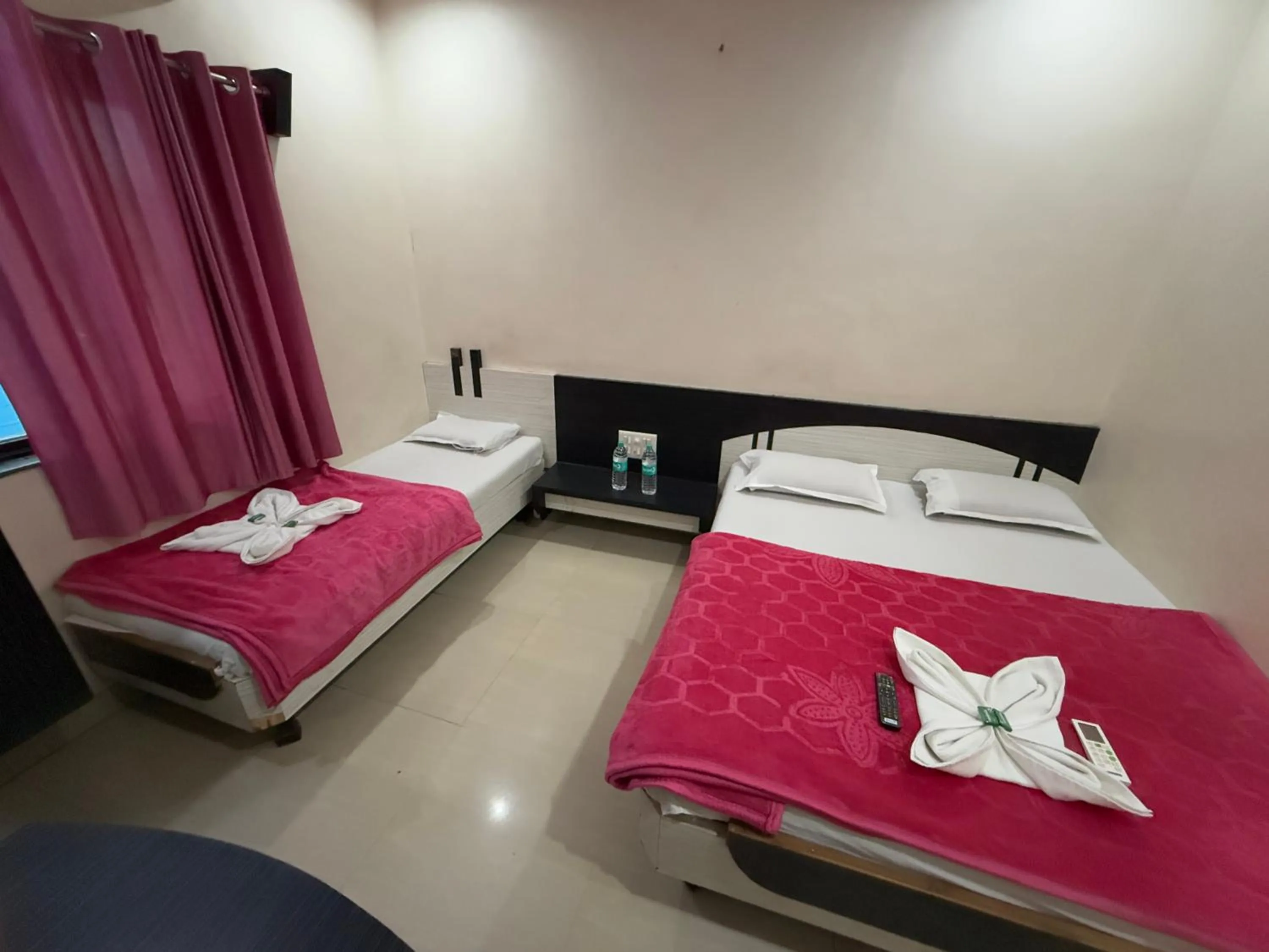Bed in Hotel Temple Sai