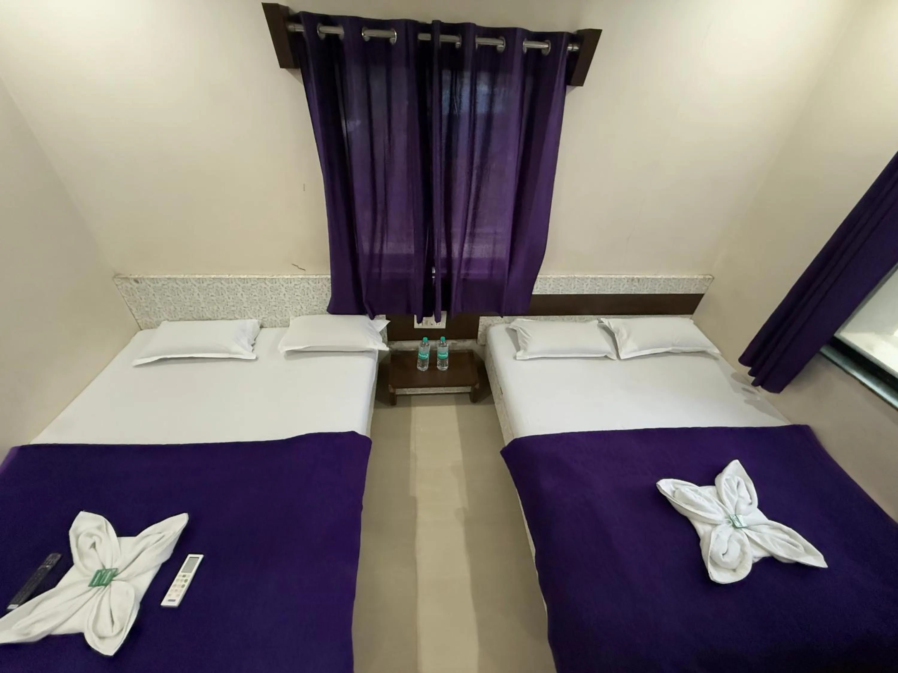 Bed in Hotel Temple Sai