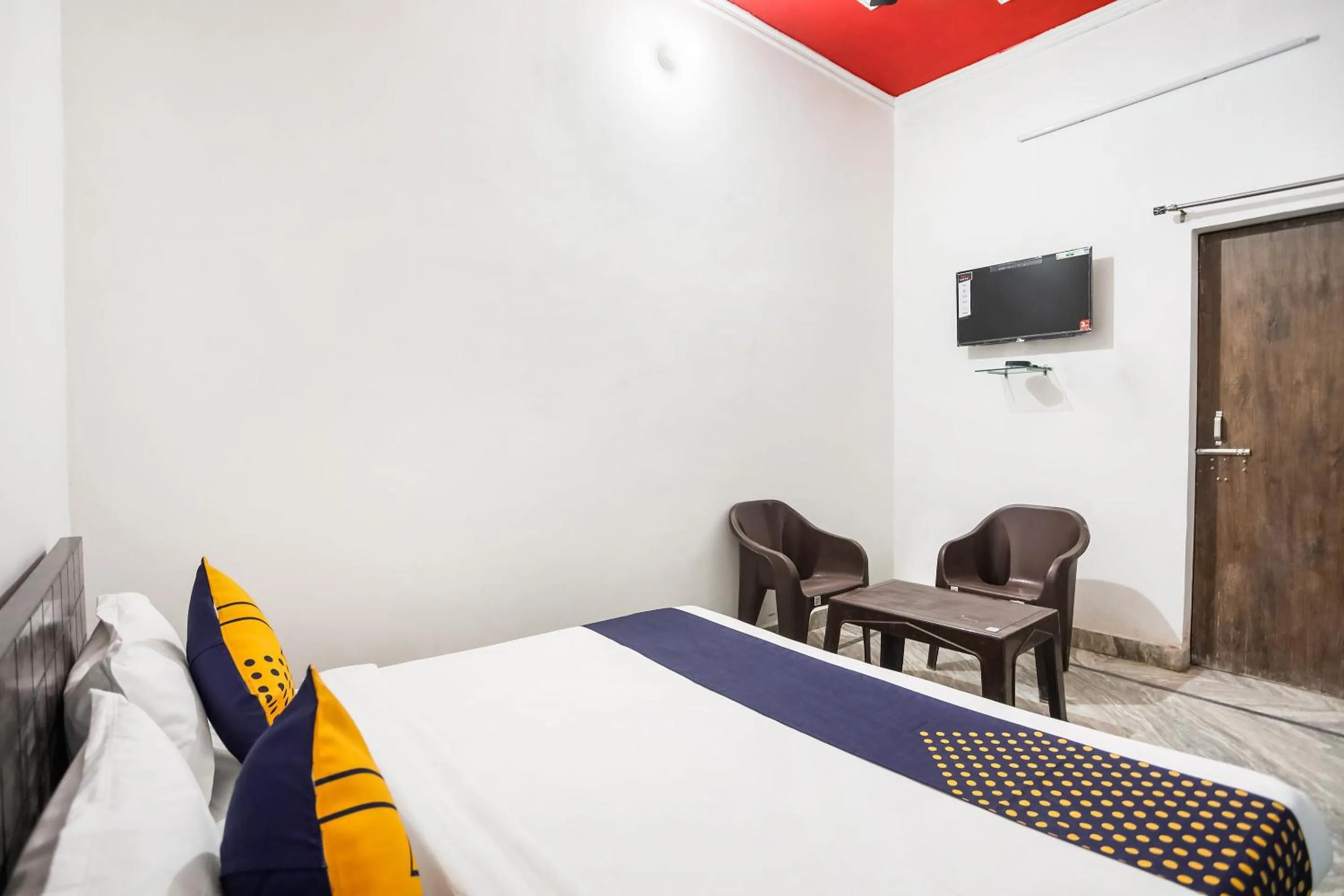 Bedroom in Hotel O by OYO Dollar