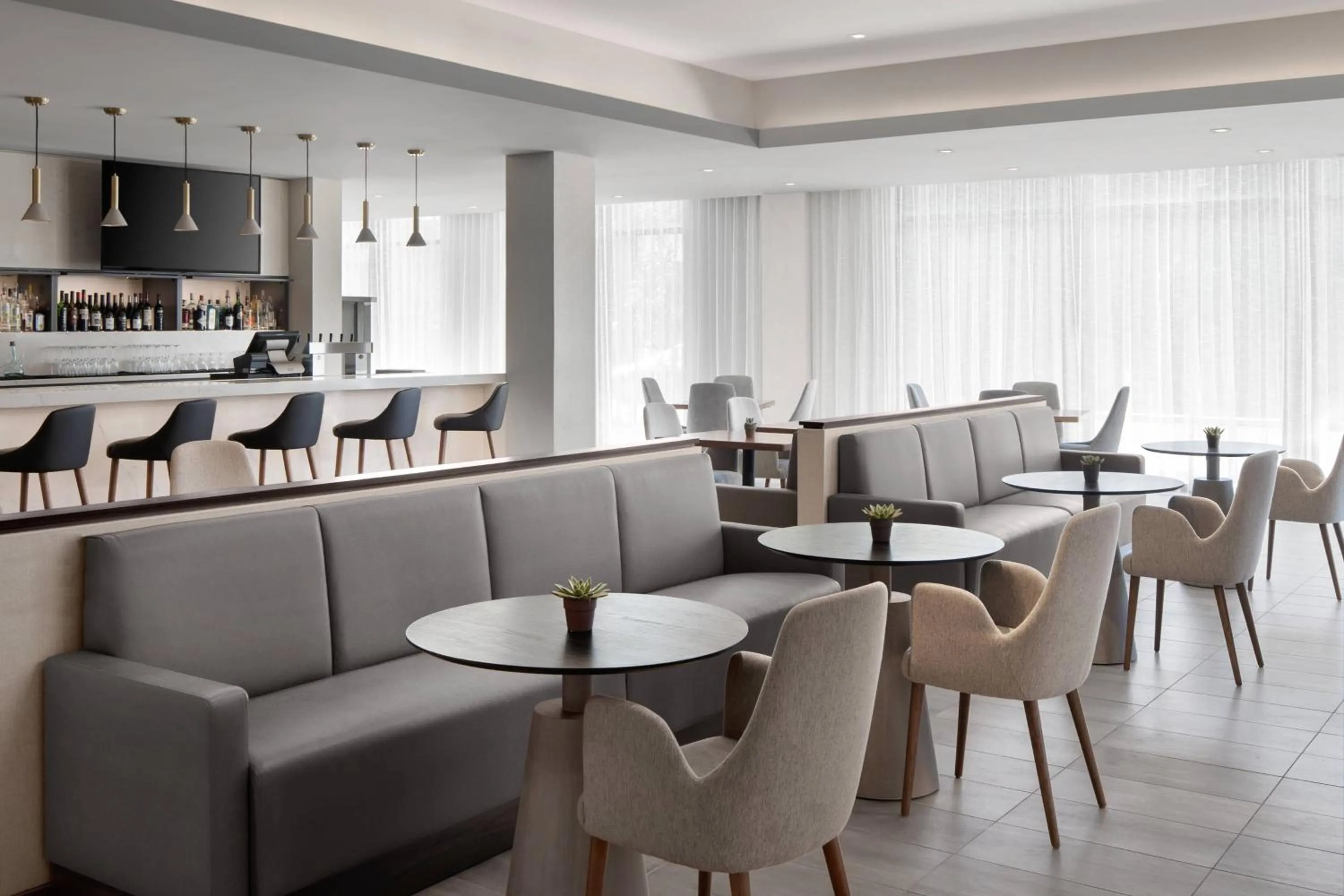 Lounge or bar in AC Hotel by Marriott Santa Rosa Sonoma Wine Country