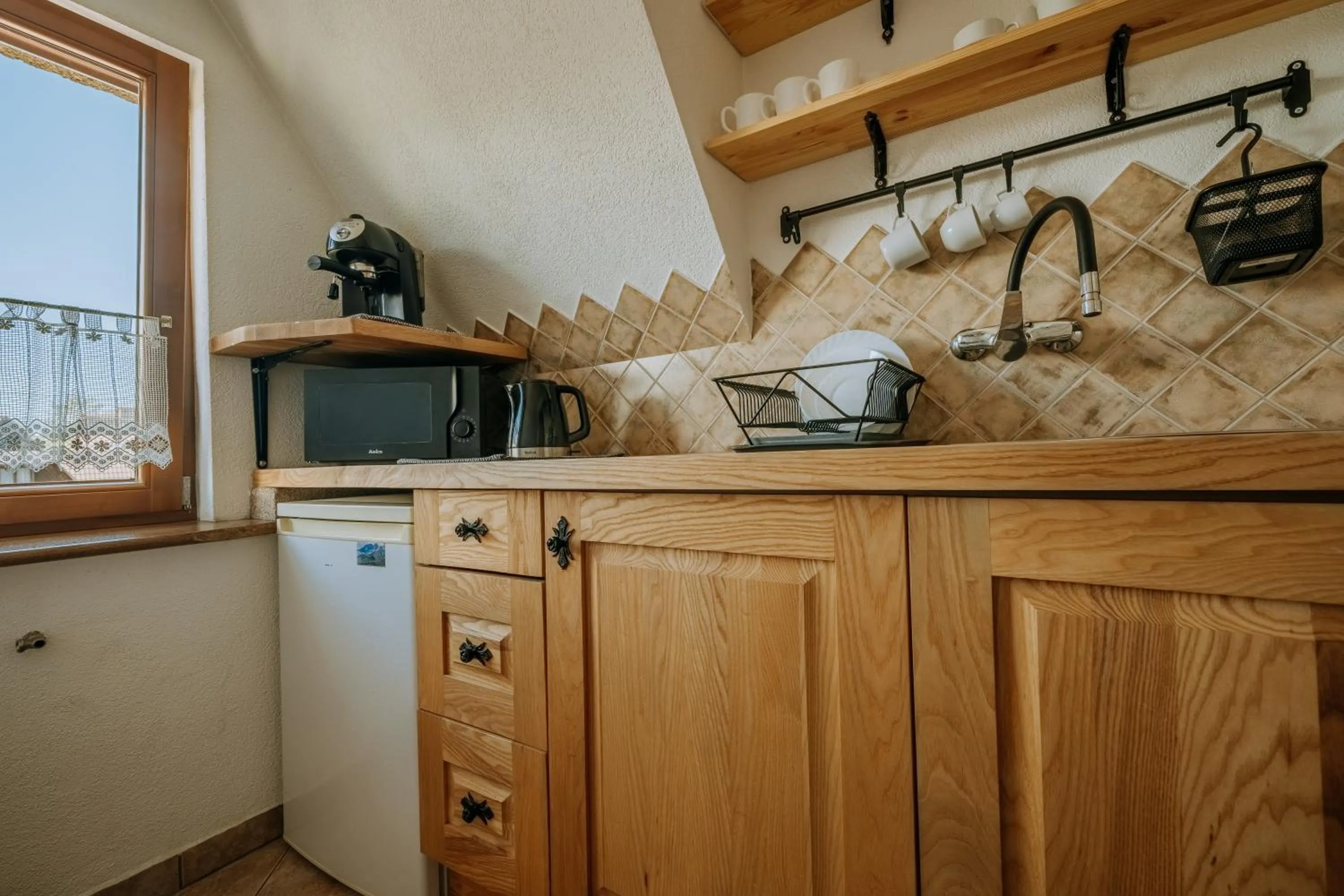 Kitchen or kitchenette in Gościna u Maryny Relaks i SPA w Ogrodzie