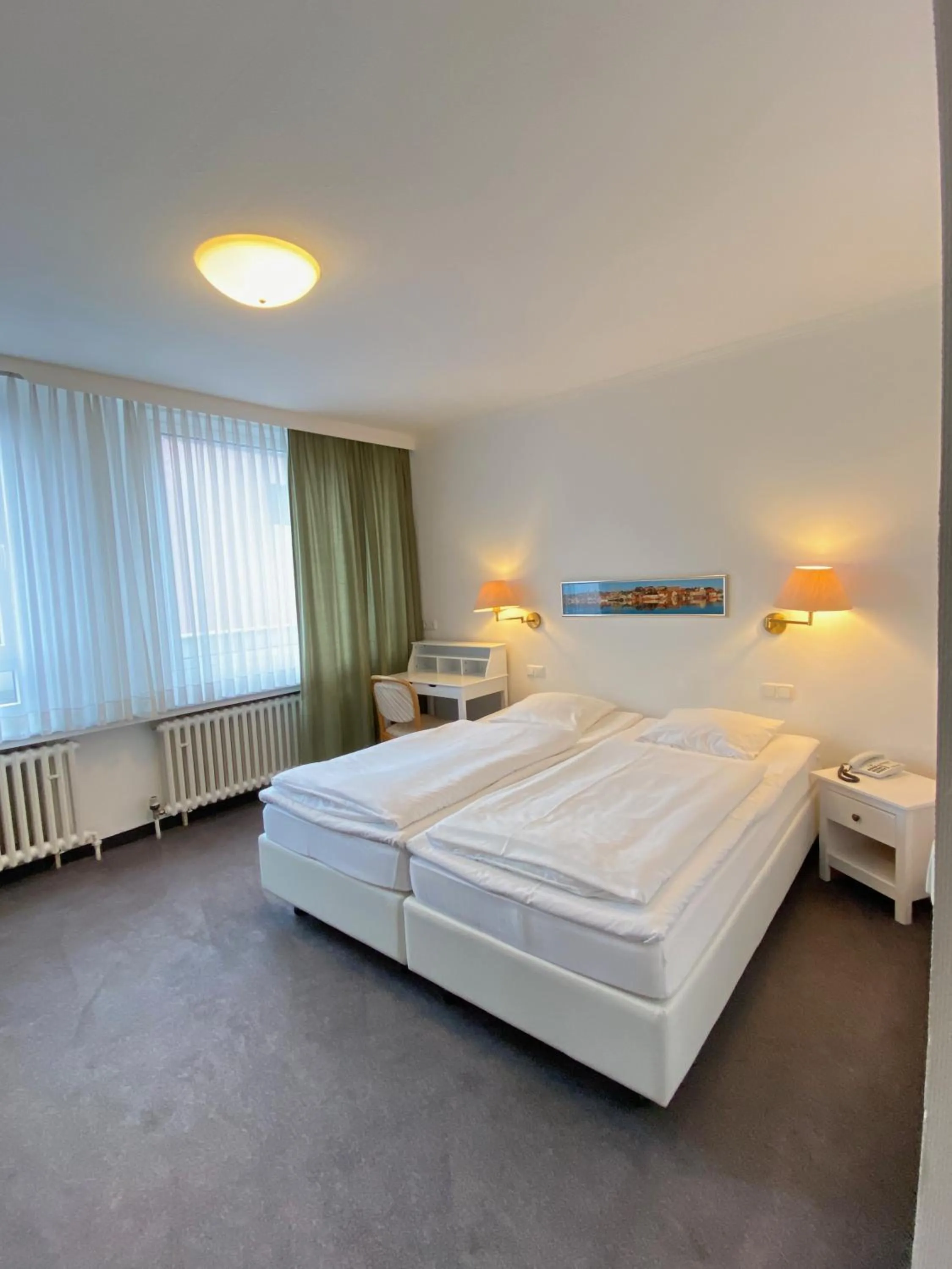 Photo of the whole room, Bed in Hotel Flensburger Hof