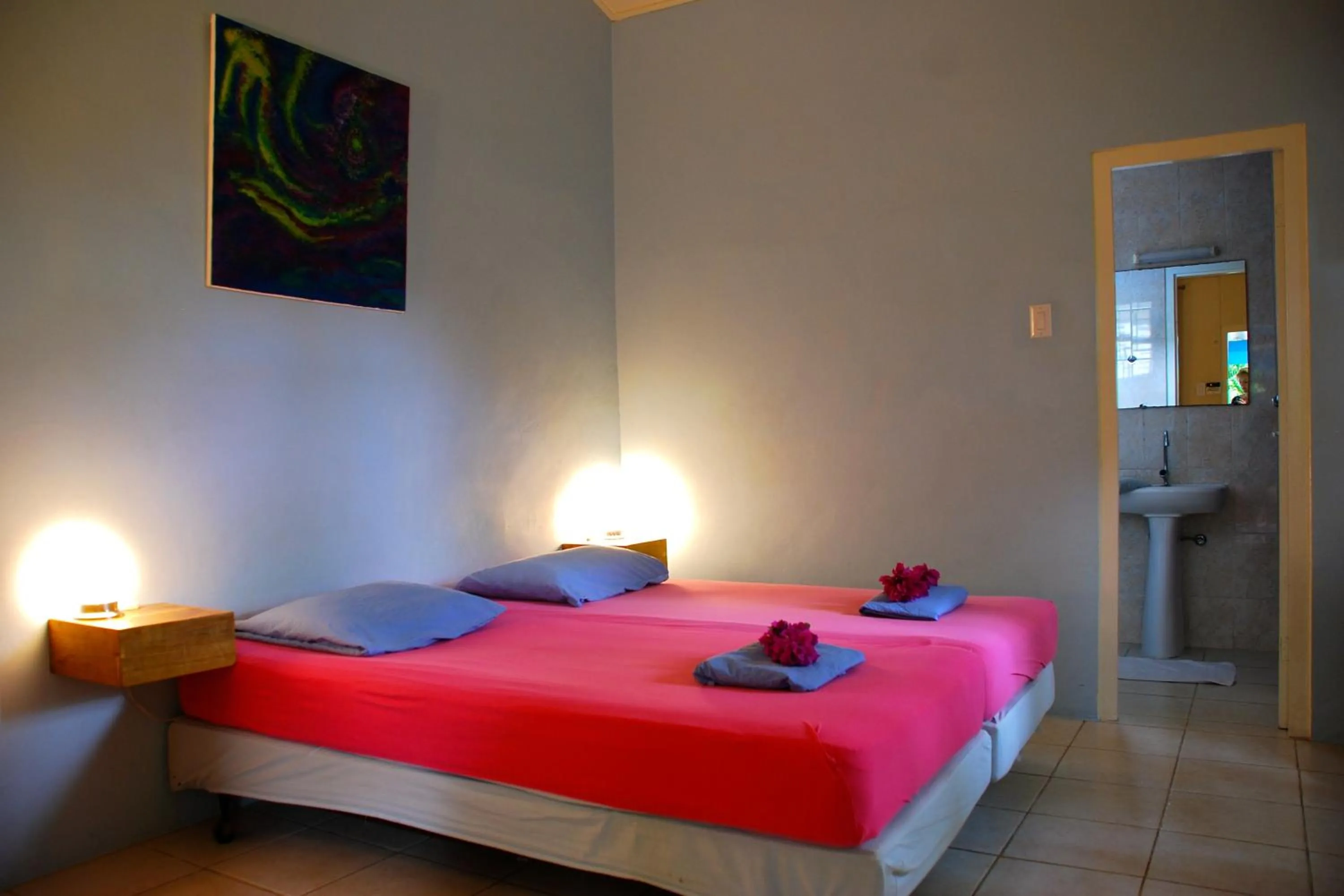 Bedroom, Bed in Caribbean Flower Apartments