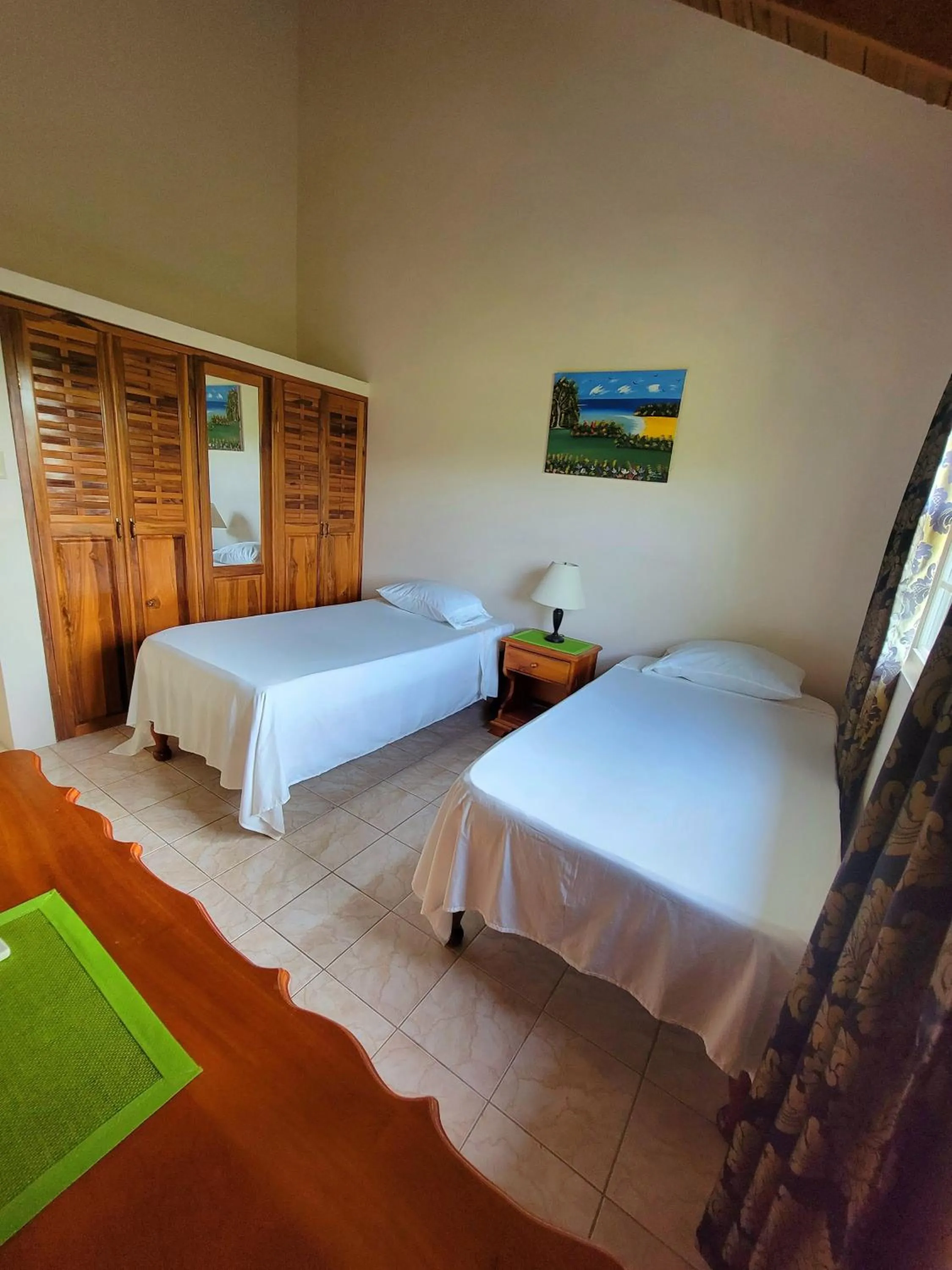 Photo of the whole room, Bed in Green's Palace Jamaica