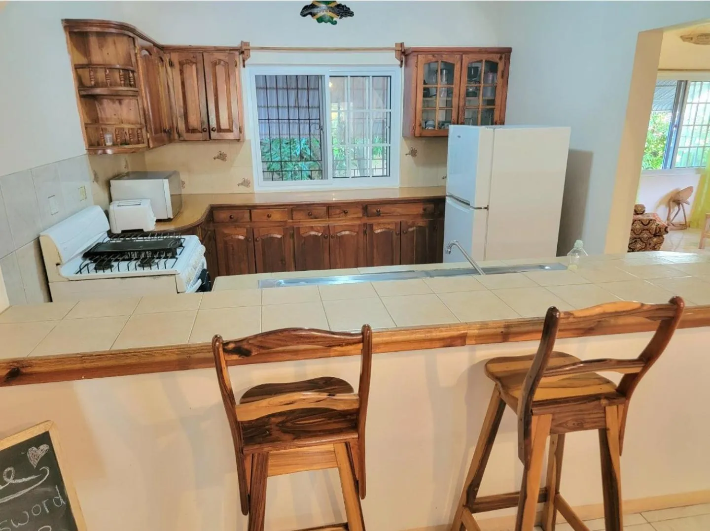 Kitchen or kitchenette in Green's Palace Jamaica