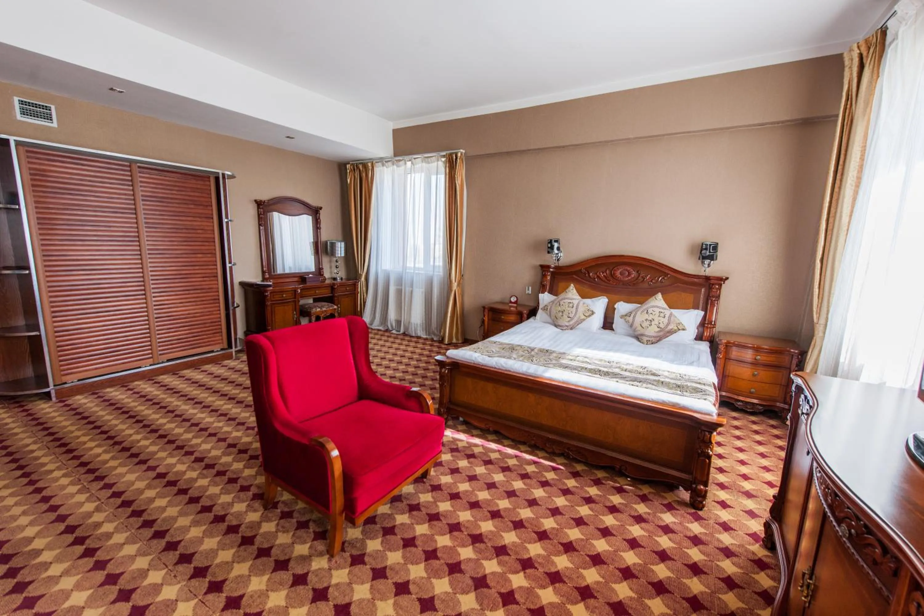 Photo of the whole room, Bed in UB City Hotel