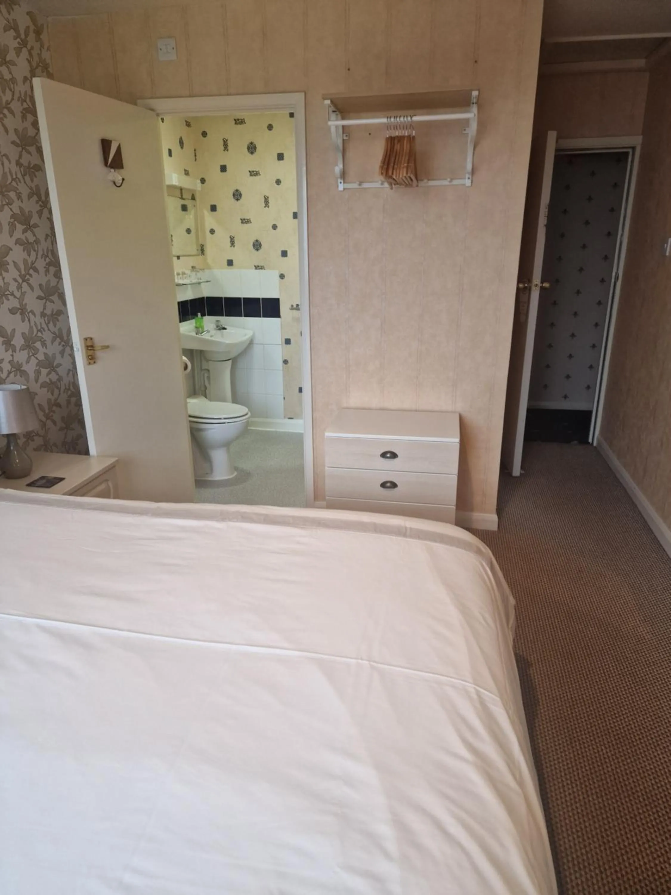 Bathroom, Bed in The Sands Hotel