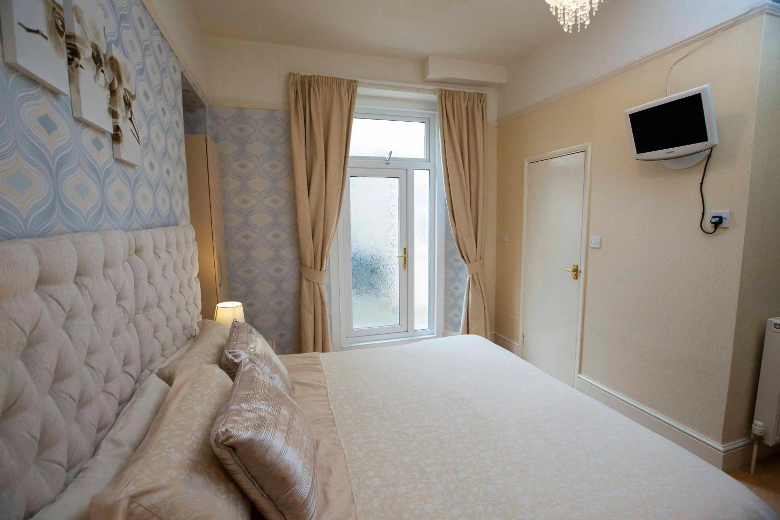 Photo of the whole room, Bed in The Sands Hotel