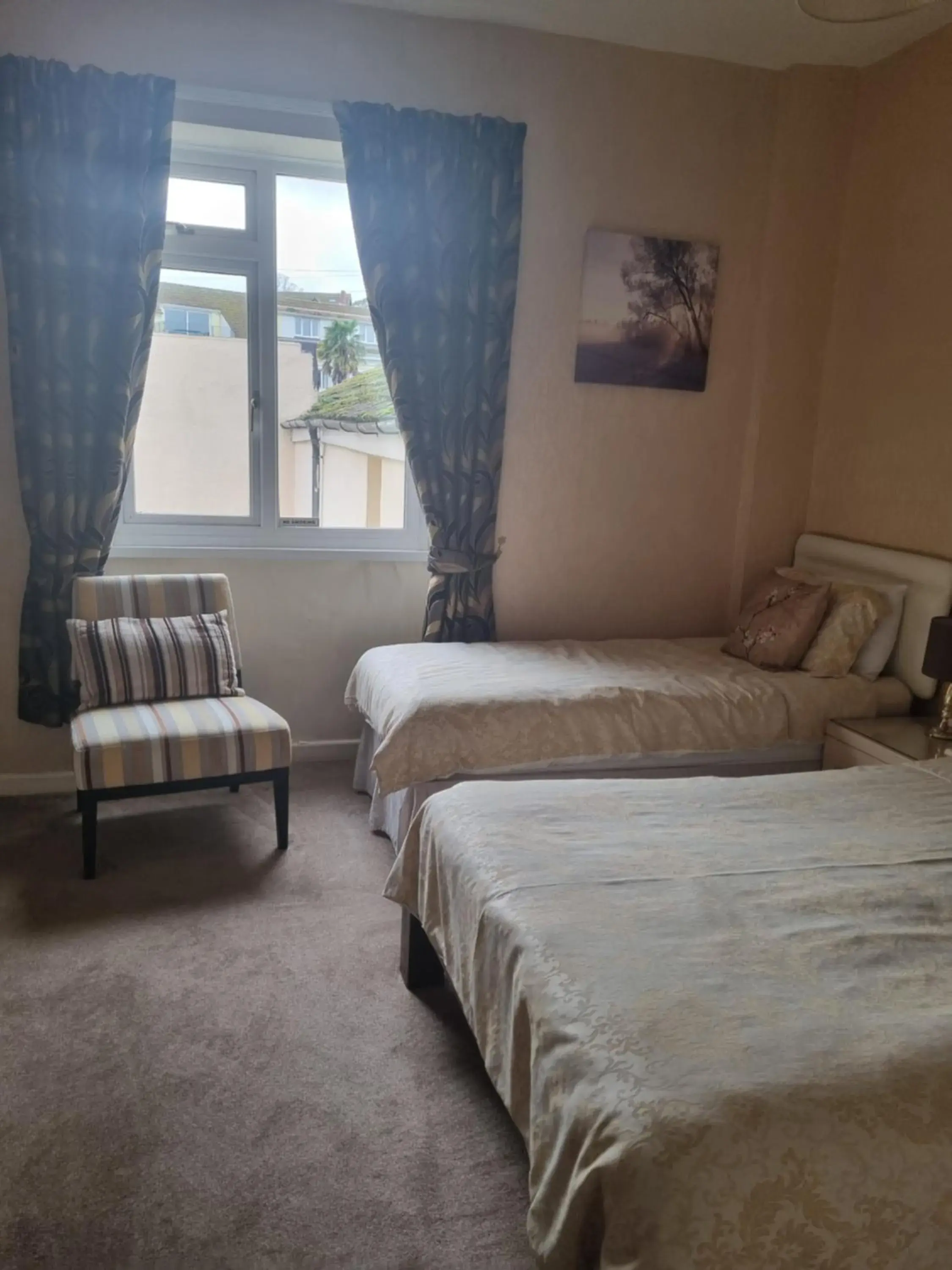 Triple Room with Private Bathroom in The Sands Hotel Triple Room with Private Bathroom in The Sands Hotel