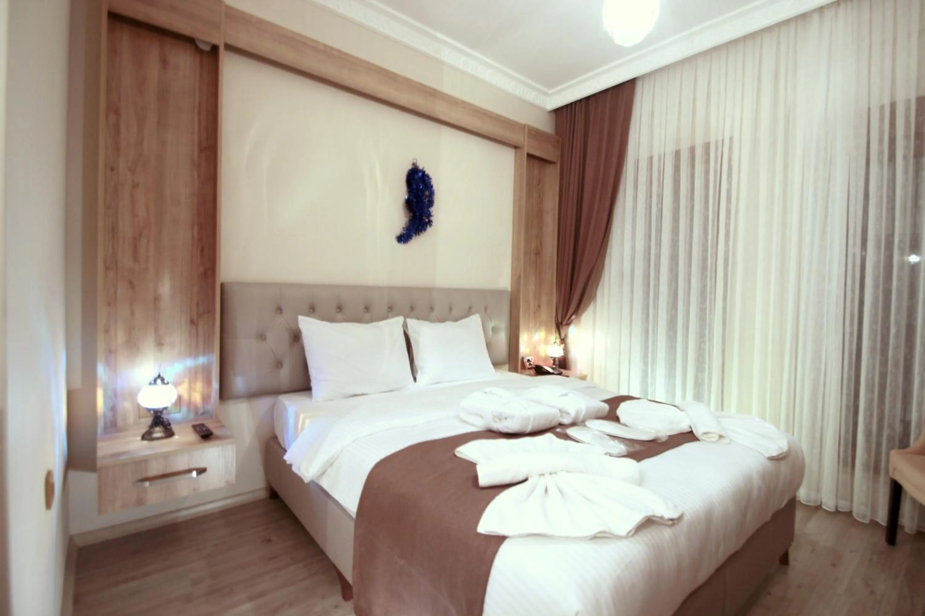 Bed in Butterfly Butik Hotel