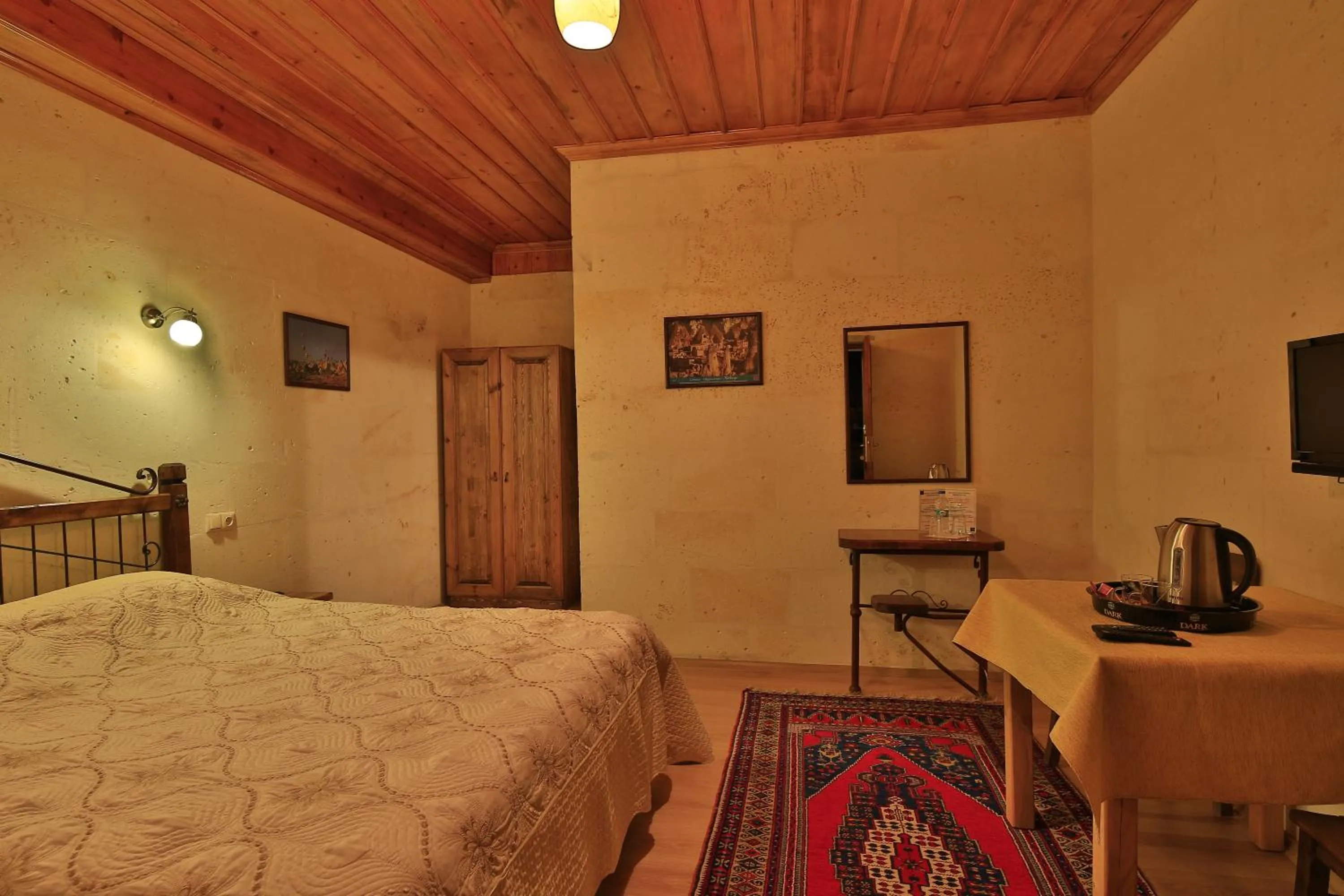 Bed in Kemal's Guest House