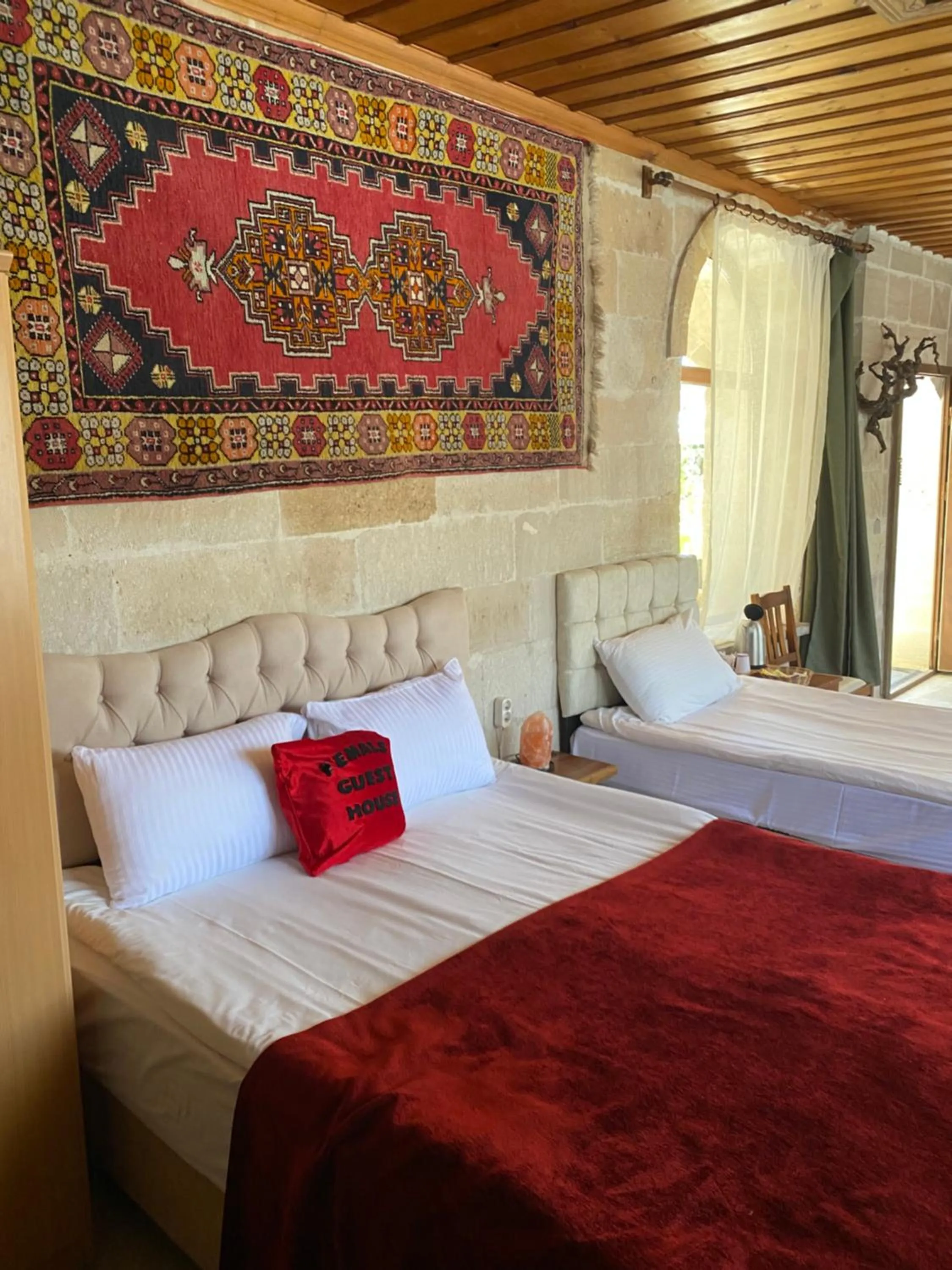 Bed in Kemal's Guest House