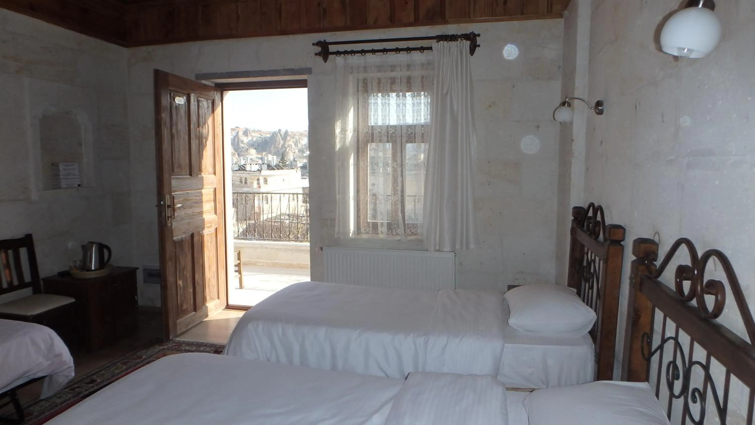 Bed in Kemal's Guest House