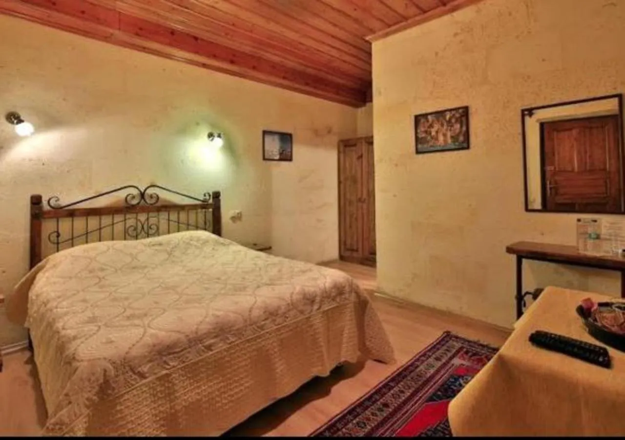 Bed in Kemal's Guest House