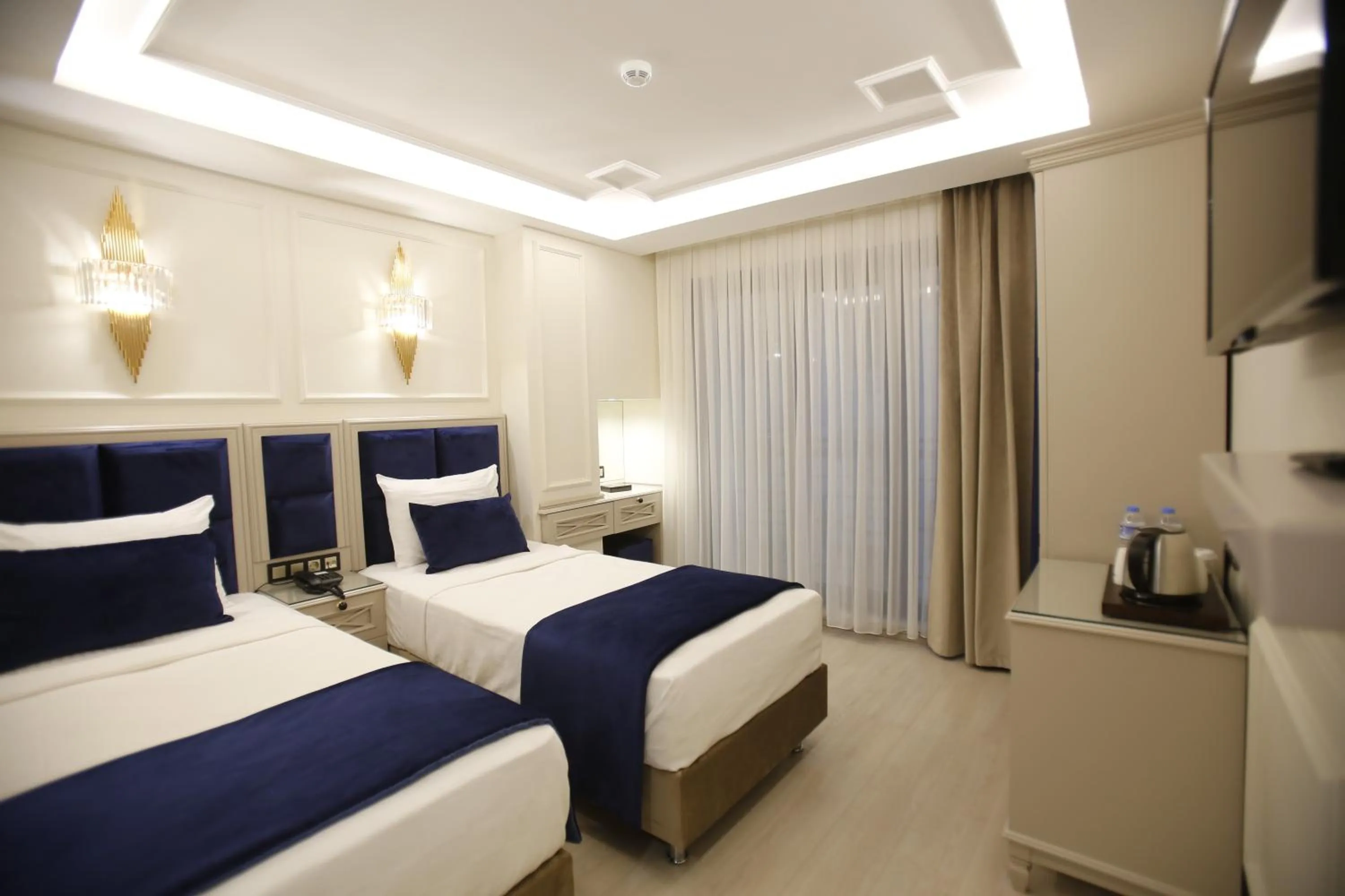 Photo of the whole room, Bed in OMMA HOTEL